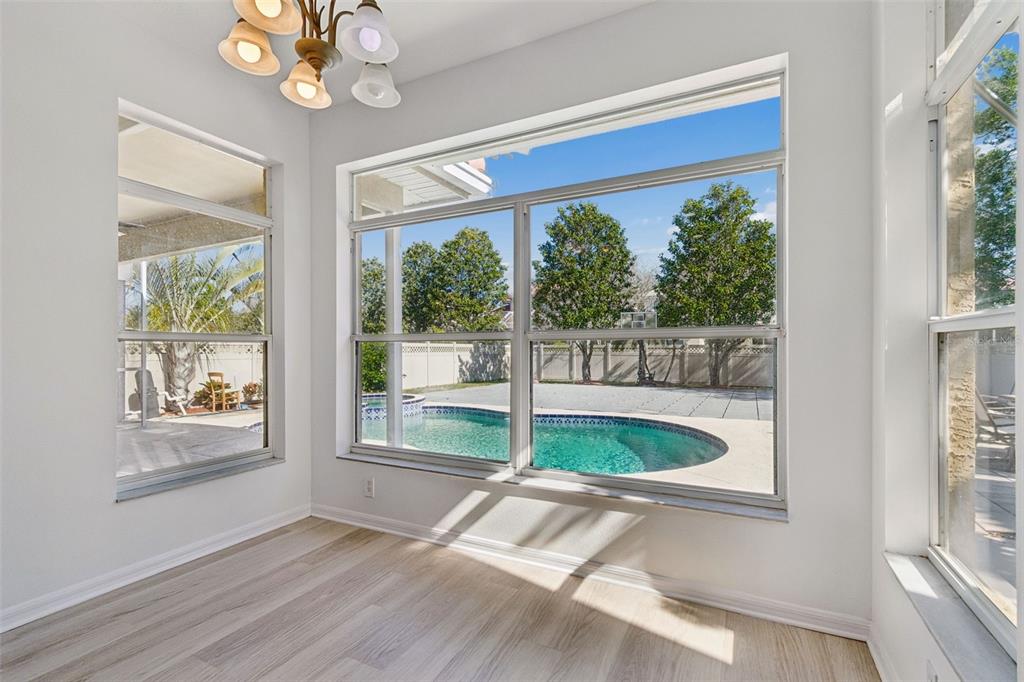 2300 Hannah Way South Dunedin, FL 34698 - Photo 8 of 49 a wooden floor in a room next to a window