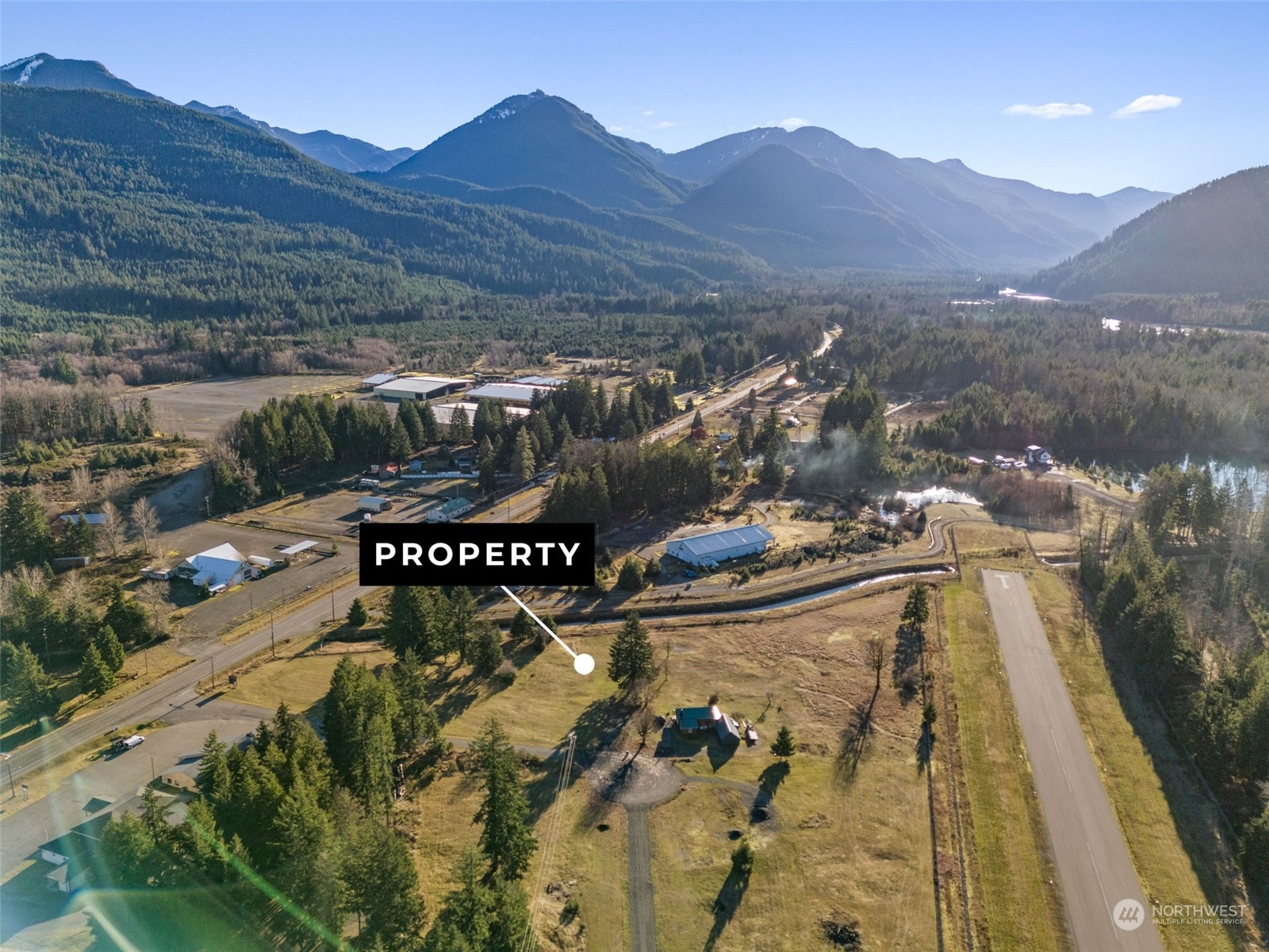 115 Huntington Road Packwood, WA 98361 - Photo 14 of 14 a view of a street with a mountain in the background