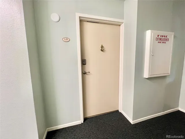 a view of elevator with hallway