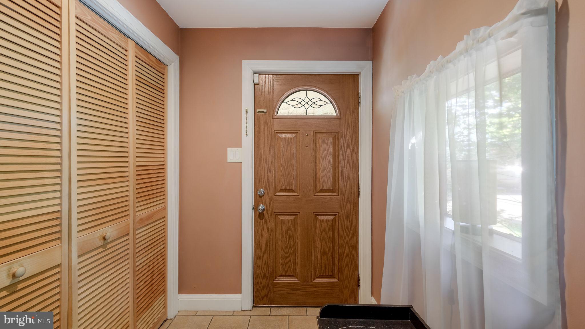 500 Prospect Road Warminster, PA 18974 - Photo 4 of 28 a view of a bathroom with wooden door