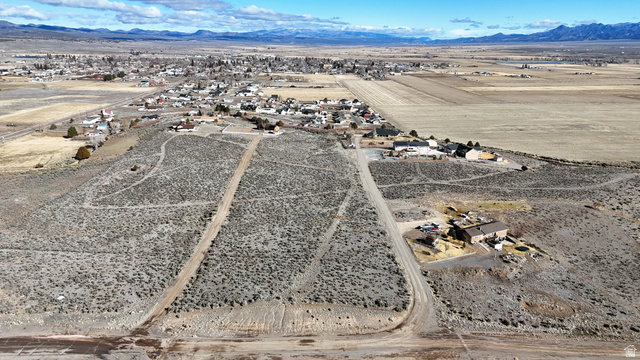 230 East D D Holw Road Panguitch, UT 84759 - Photo 8 of 37 Aerial view of sparsely populated area featuring a mountain backdrop