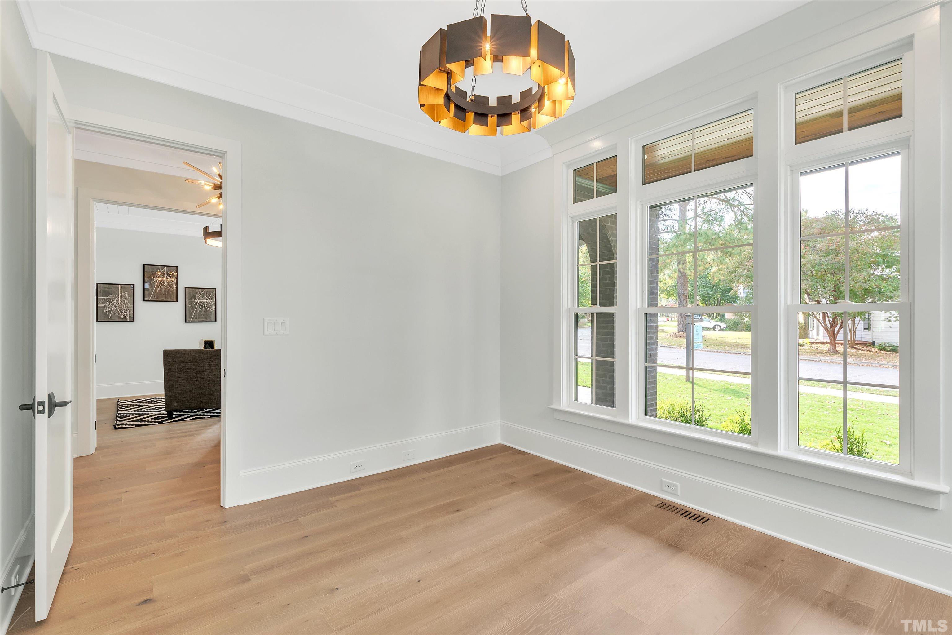 2000 Pine Drive Raleigh, NC 27608 - Photo 11 of 39 a view of an empty room with a window