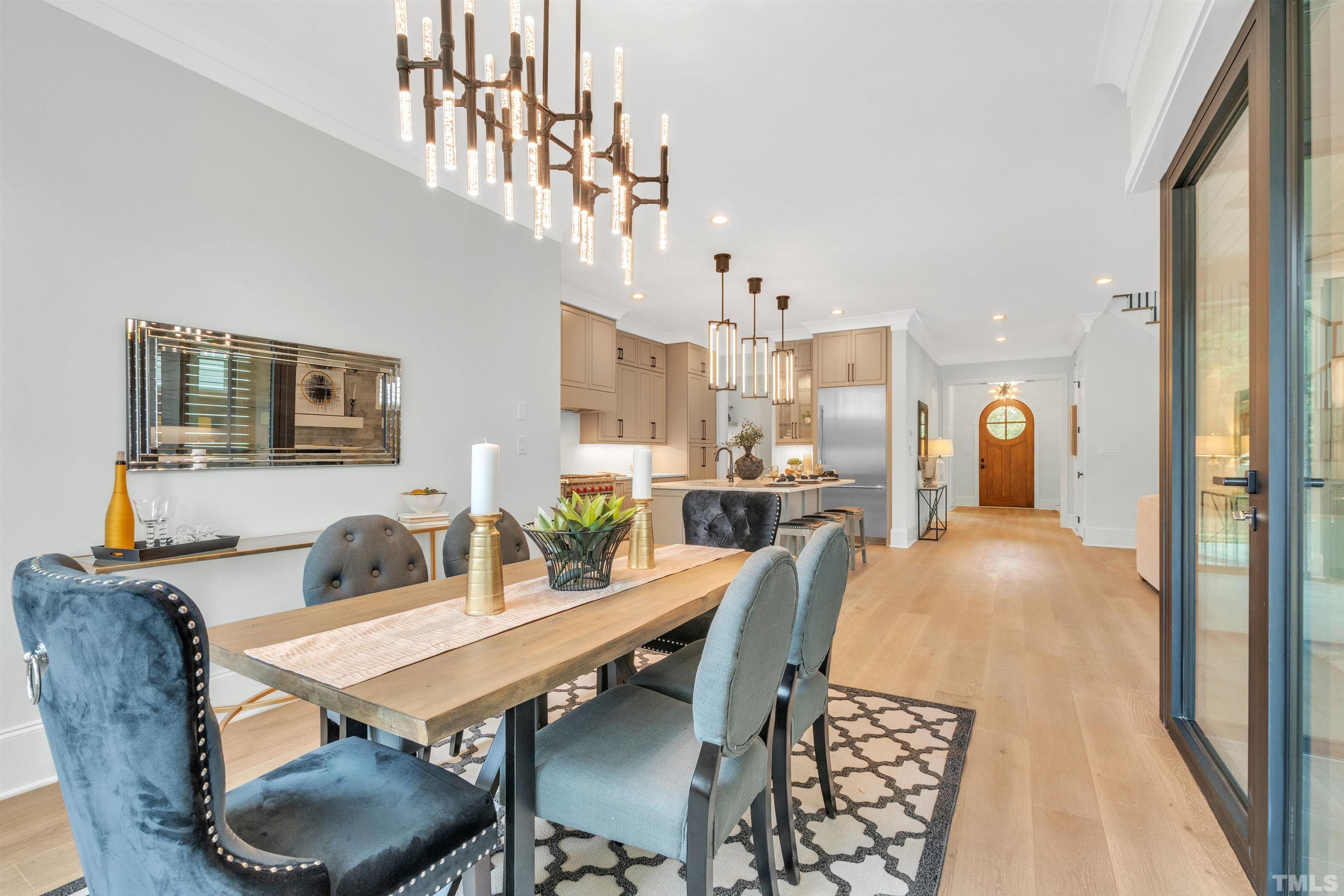 2000 Pine Drive Raleigh, NC 27608 - Photo 20 of 39 a view of a dining room with furniture and wooden floor