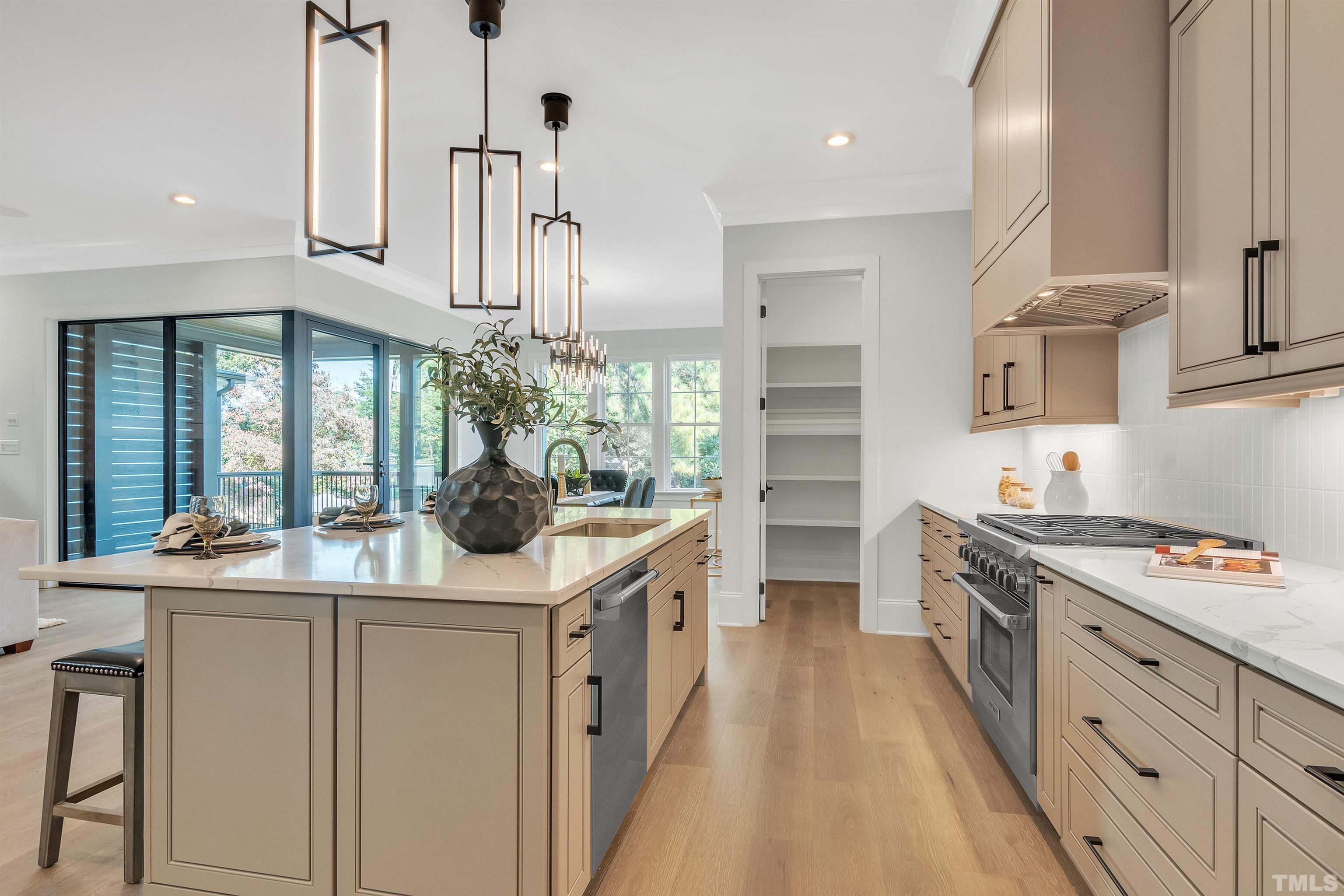 2000 Pine Drive Raleigh, NC 27608 - Photo 21 of 39 a kitchen with stainless steel appliances granite countertop a sink and stove