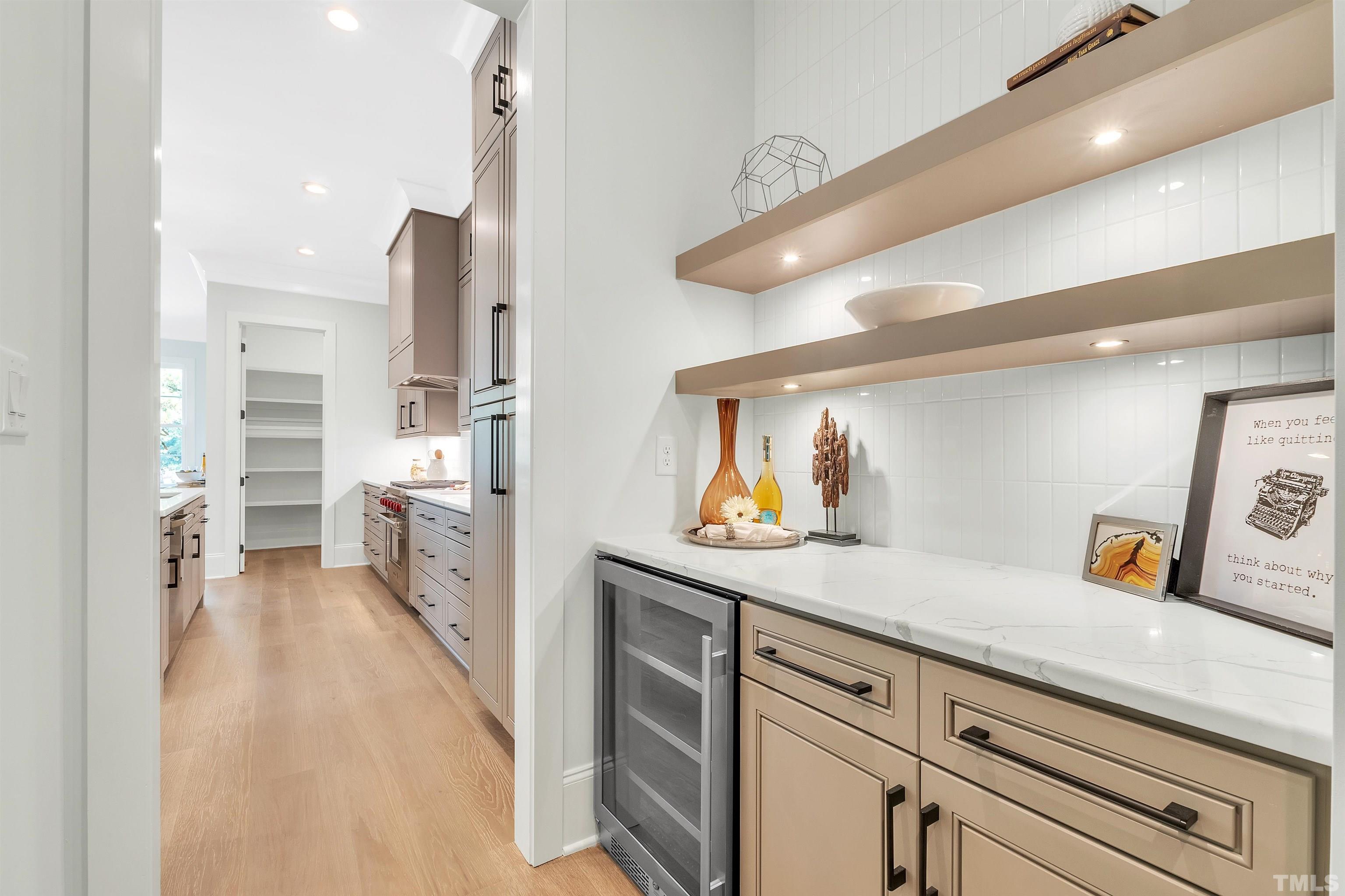 2000 Pine Drive Raleigh, NC 27608 - Photo 22 of 39 a view of a kitchen with a sink and cabinets