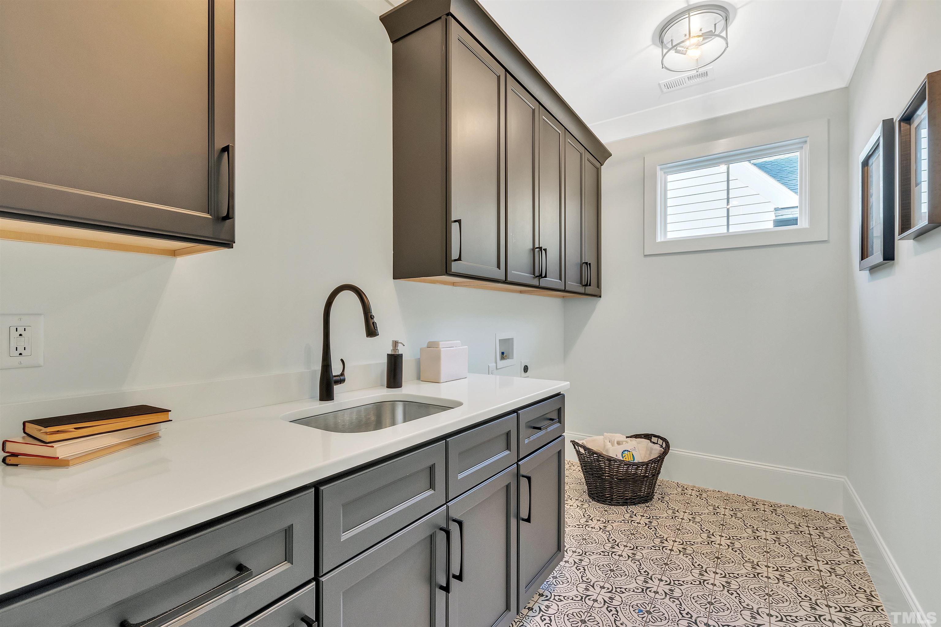 2000 Pine Drive Raleigh, NC 27608 - Photo 25 of 39 a bathroom with a sink and a toilet