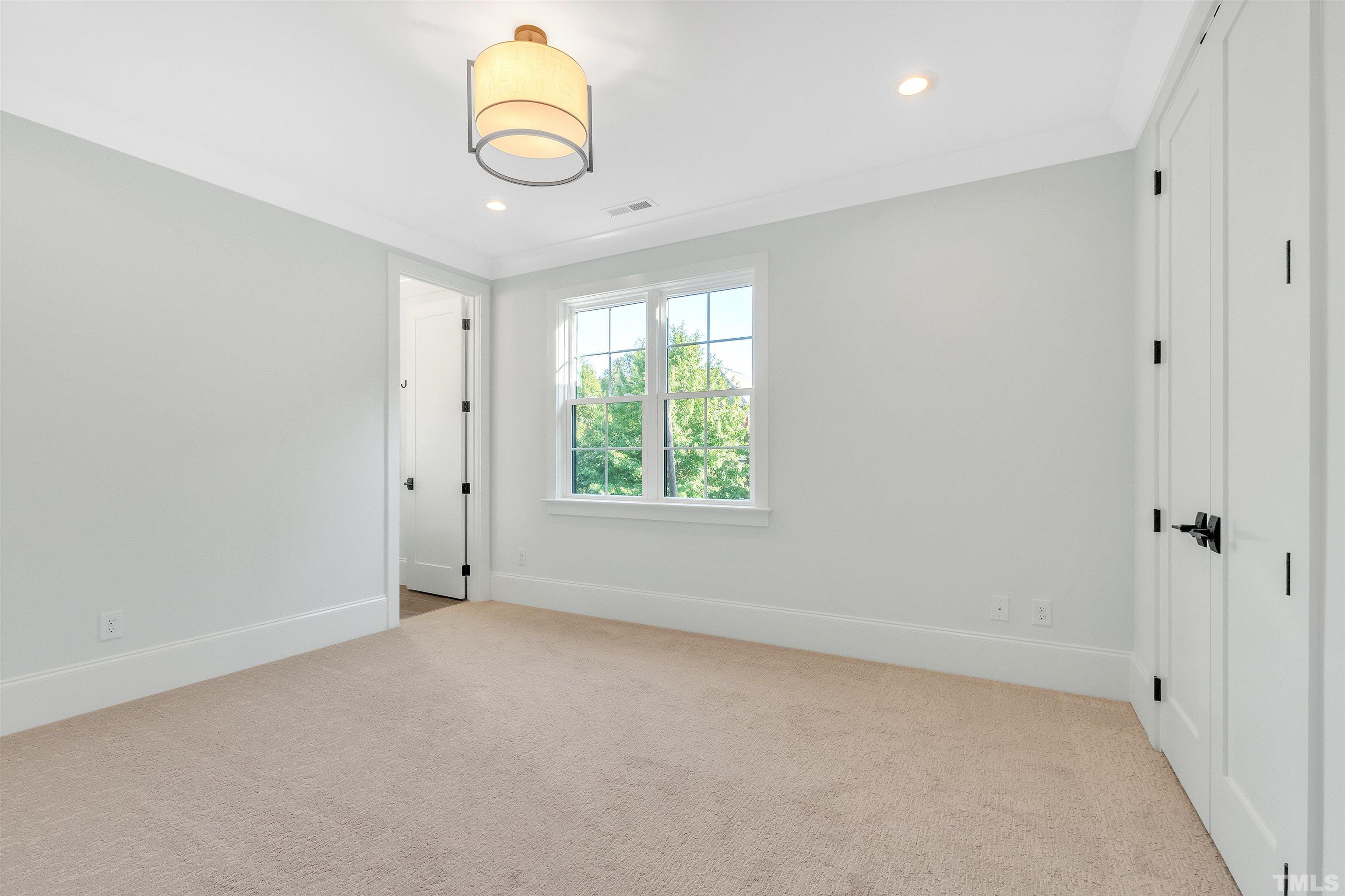 2000 Pine Drive Raleigh, NC 27608 - Photo 30 of 39 a view of an empty room with a window