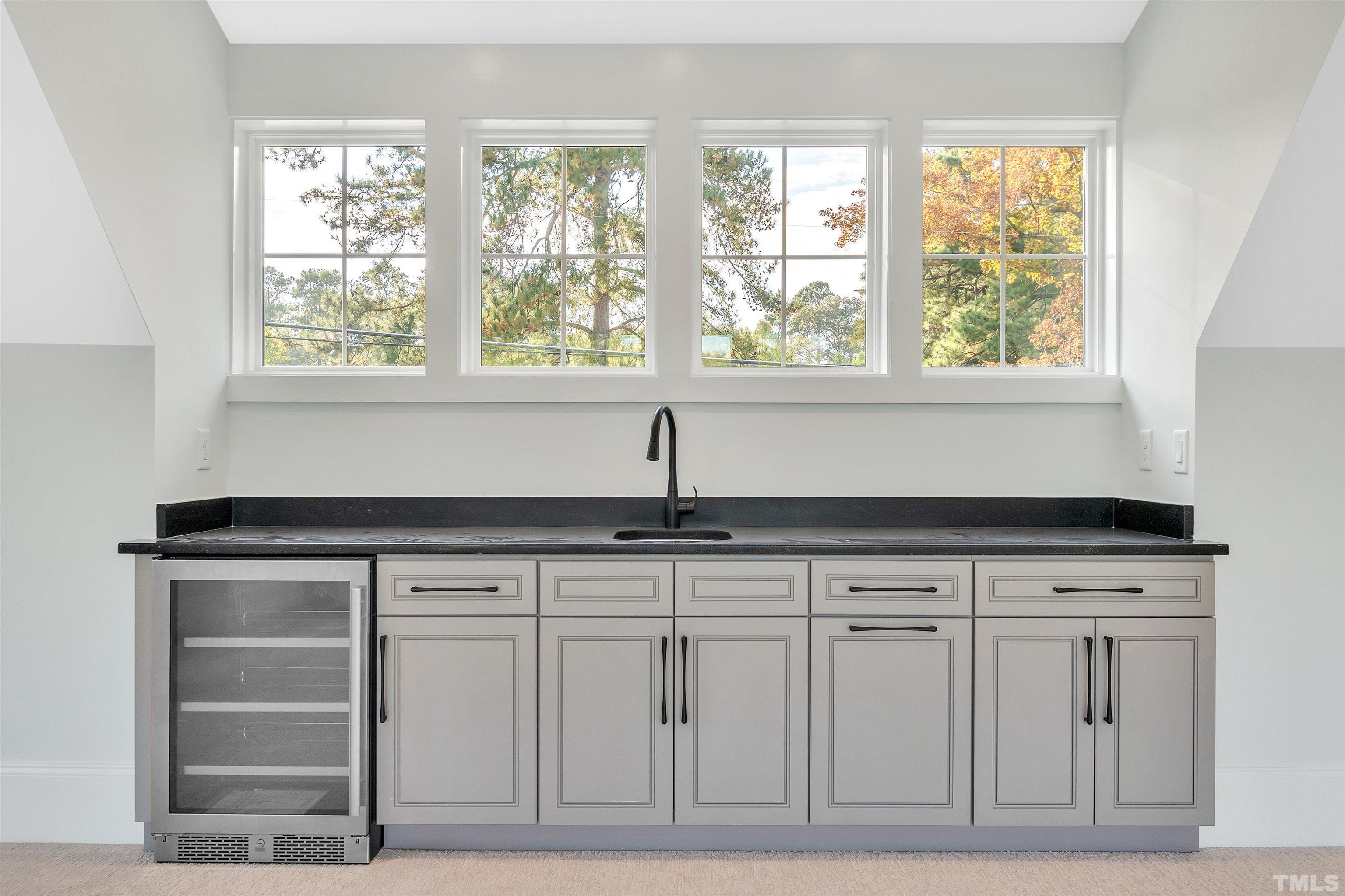 2000 Pine Drive Raleigh, NC 27608 - Photo 32 of 39 a view of cabinets with window