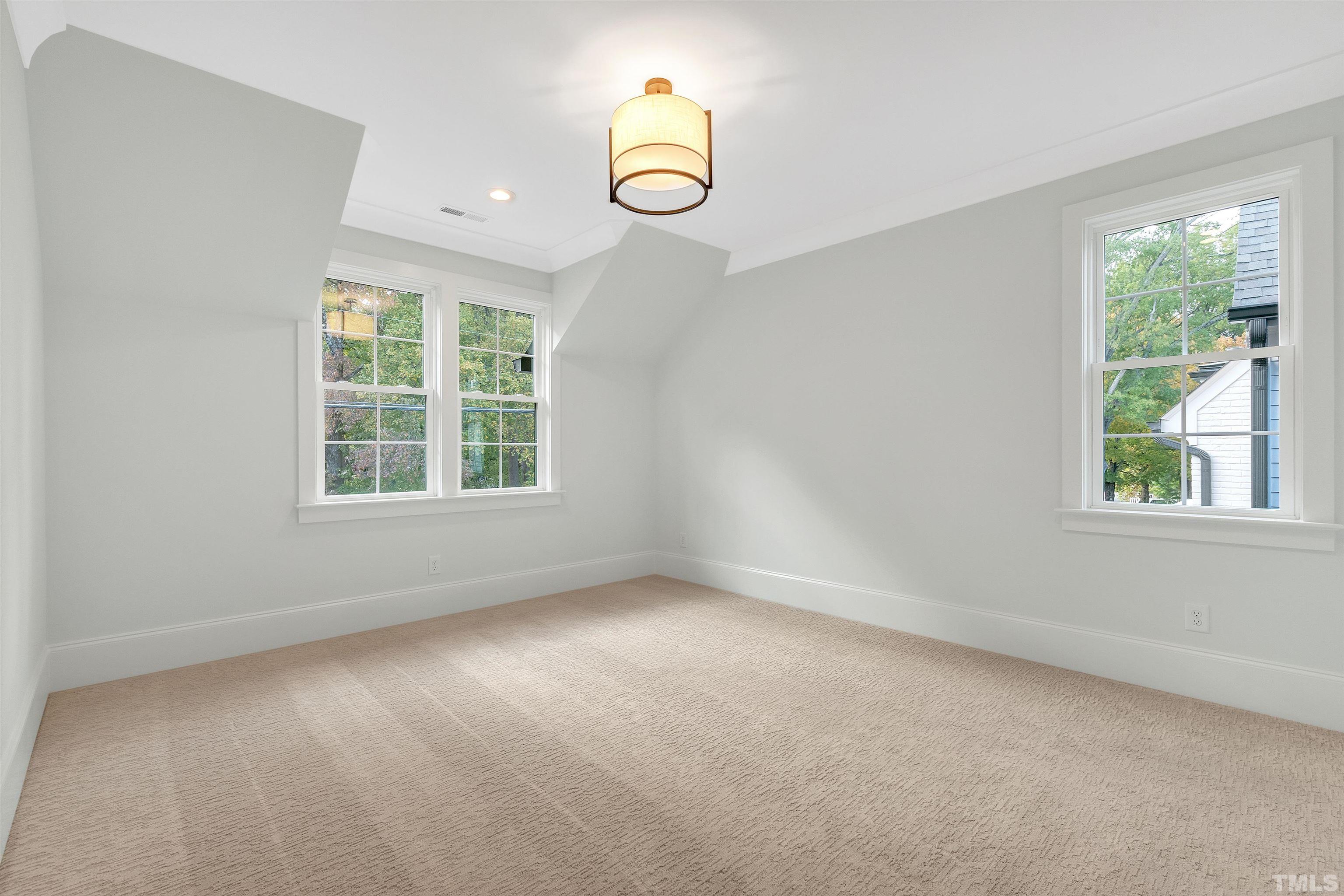 2000 Pine Drive Raleigh, NC 27608 - Photo 37 of 39 an empty room with a window