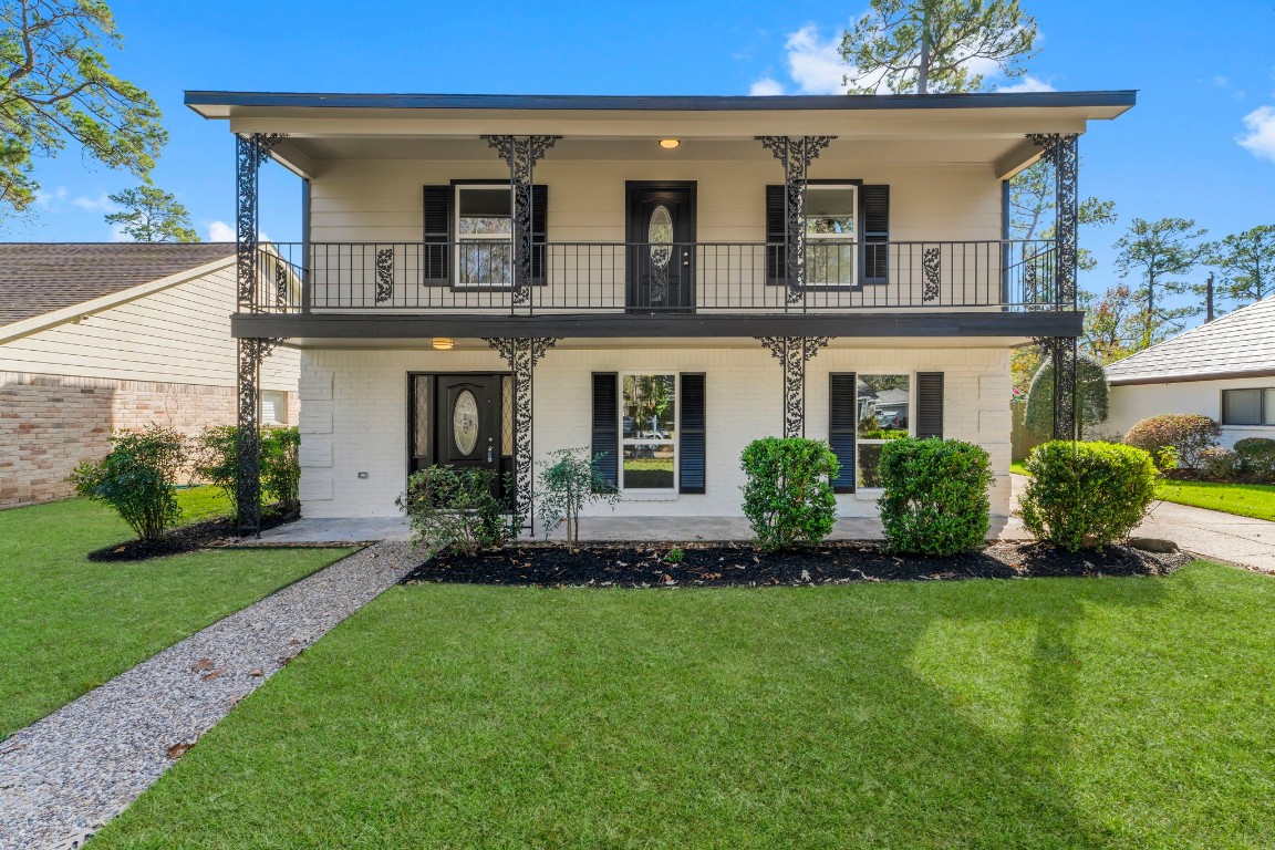 Southern Charm Meets Modern Elegance. Welcome to 7911 Kleingreen Lane, a stunning two-story home makes a grand first impression with its crisp white brick, striking black shutters, and intricate wrought-iron detailing.