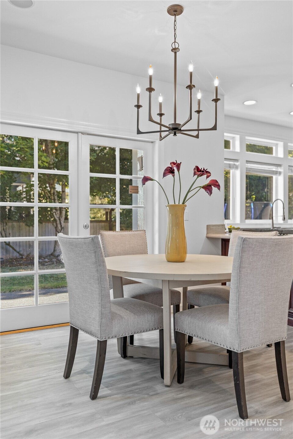 5217 76th Ave Court West University Place, WA 98467 - Photo 16 of 36 a view of a dining room with furniture window and outside view