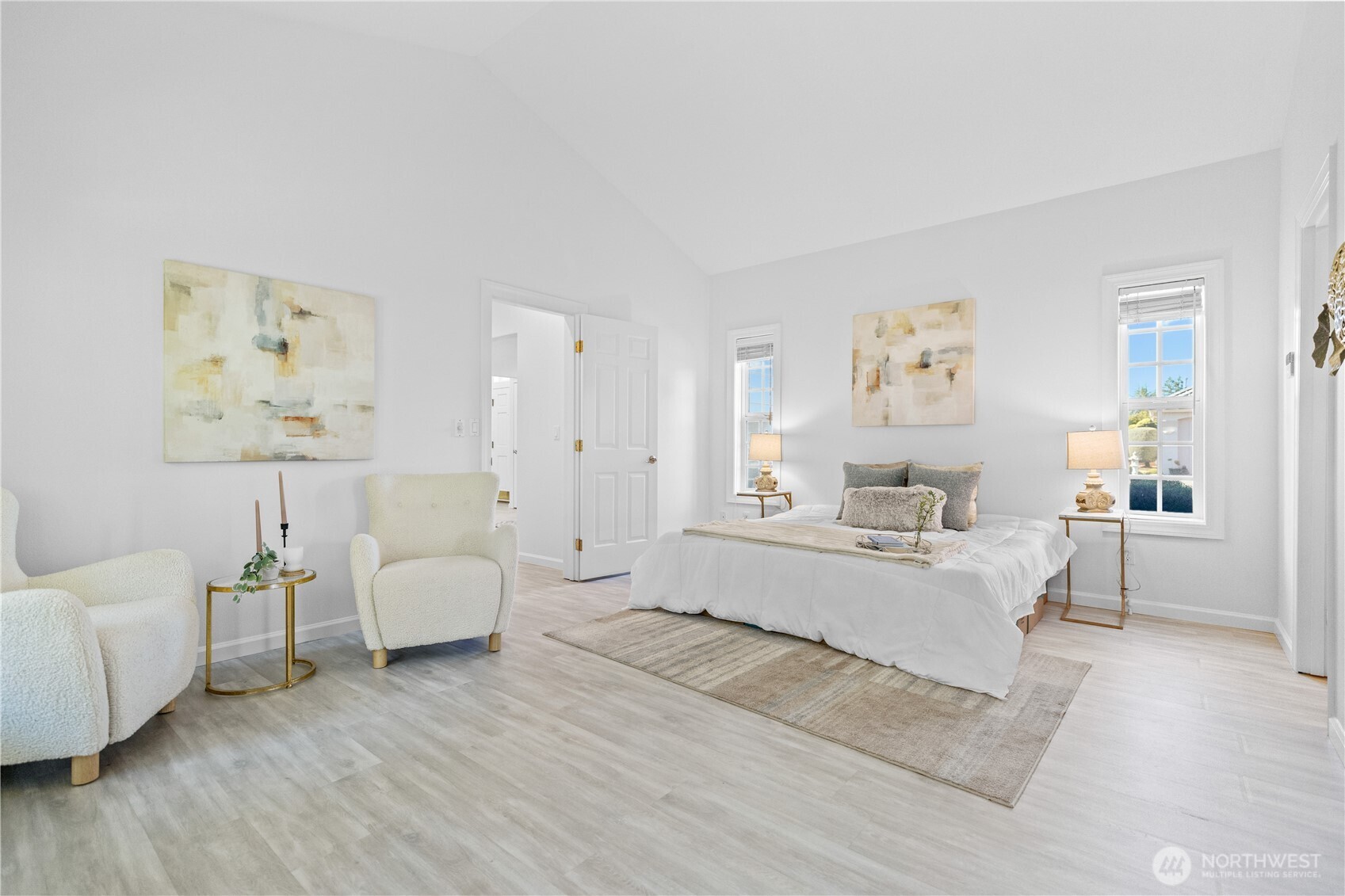 5217 76th Ave Court West University Place, WA 98467 - Photo 17 of 36 a living room with furniture and a wooden floor