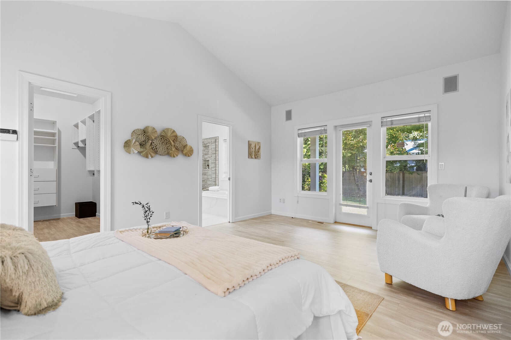 5217 76th Ave Court West University Place, WA 98467 - Photo 18 of 36 a bedroom with a bed and glass window