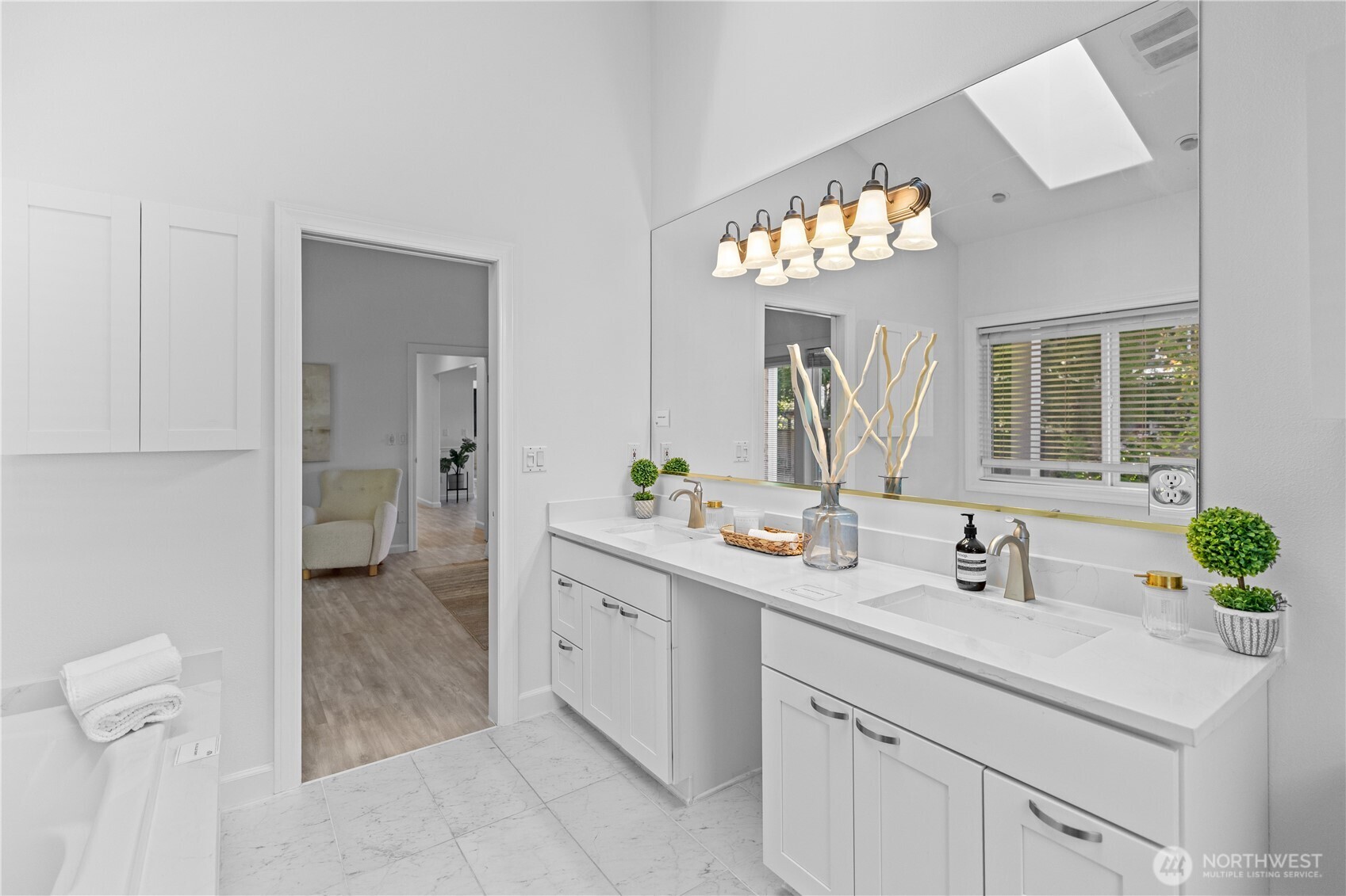 5217 76th Ave Court West University Place, WA 98467 - Photo 19 of 36 a bathroom with a sink a mirror and a toilet