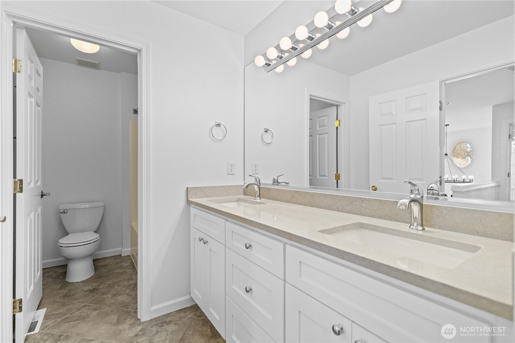 5217 76th Ave Court West University Place, WA 98467 - Photo 28 of 36 a bathroom with a sink double vanity and a toilet