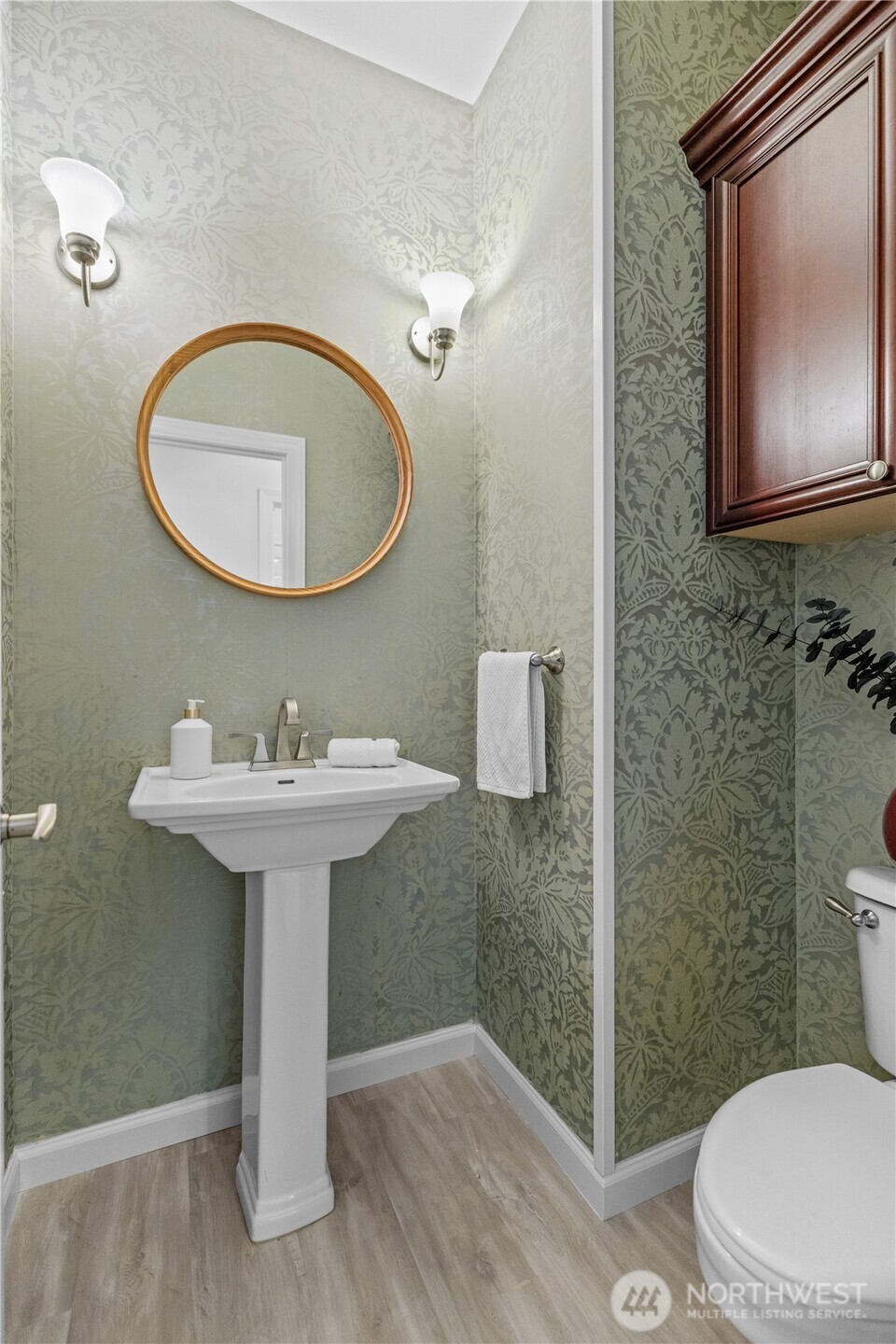 5217 76th Ave Court West University Place, WA 98467 - Photo 10 of 36 a bathroom with a sink toilet and mirror