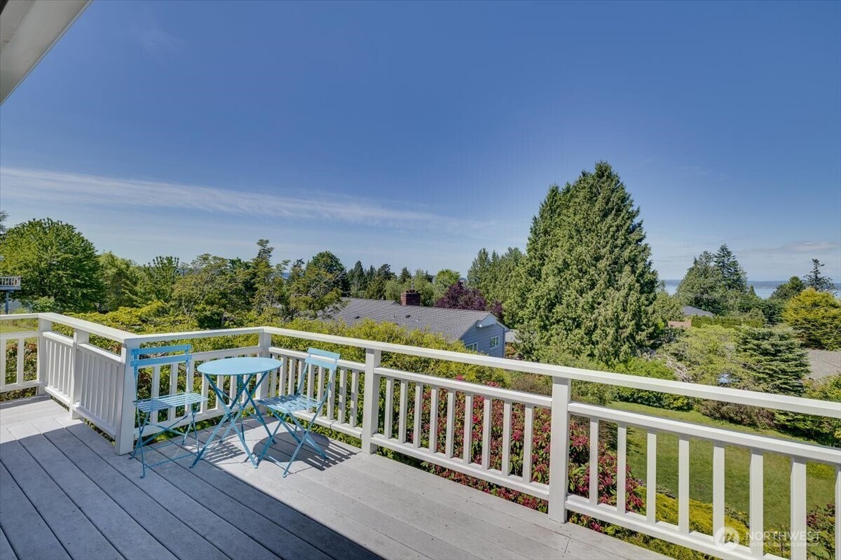 2606 49th Place Southwest Everett, WA 98203 - Photo 1 of 37 a view of a balcony with wooden floor and fence