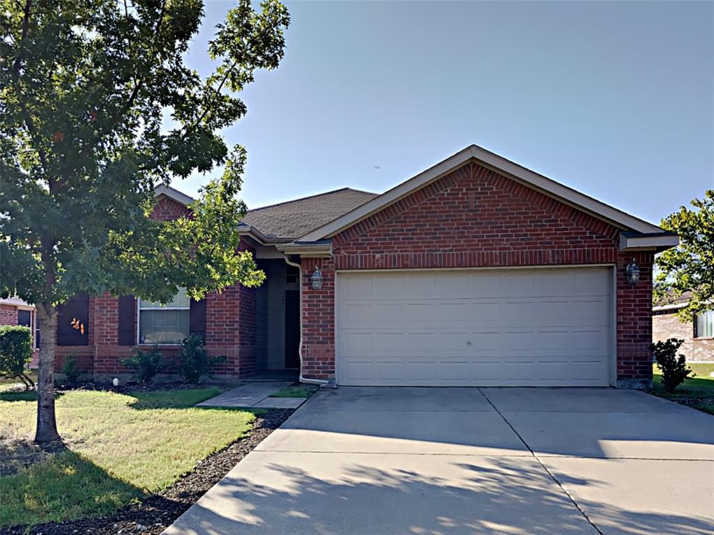 3251 Torio Grand Prairie, TX 75054 - Photo 1 of 17 a front view of a house with a yard