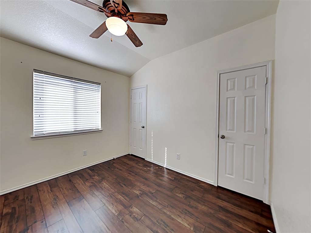 3251 Torio Grand Prairie, TX 75054 - Photo 11 of 17 a view of empty room with wooden floor and fan