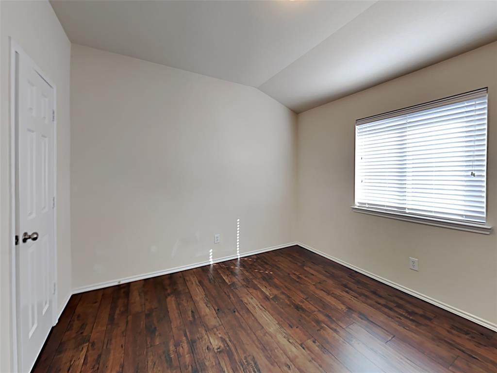3251 Torio Grand Prairie, TX 75054 - Photo 14 of 17 an empty room with wooden floor and windows