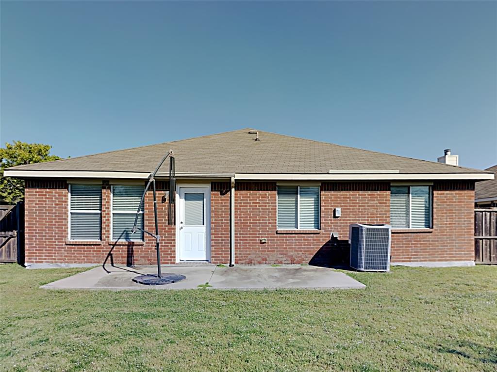 3251 Torio Grand Prairie, TX 75054 - Photo 17 of 17 a front view of a house with a yard