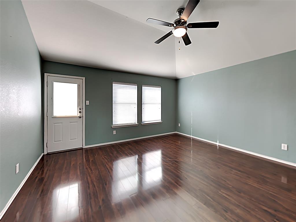 3251 Torio Grand Prairie, TX 75054 - Photo 2 of 17 wooden floor in an empty room with a window