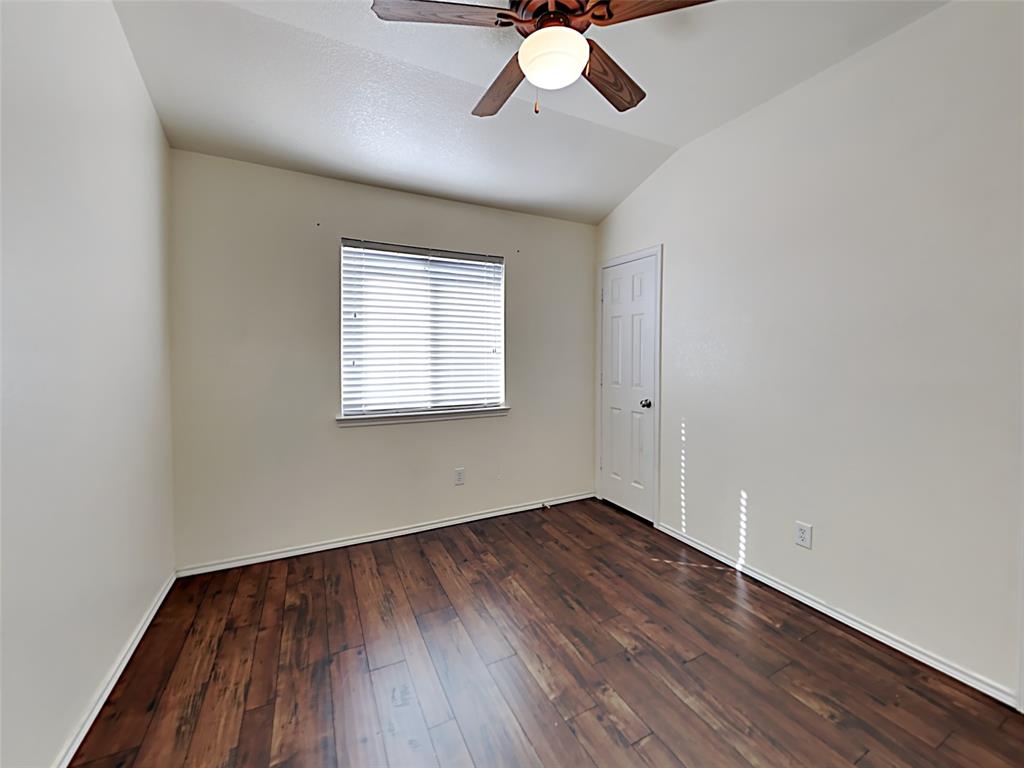 3251 Torio Grand Prairie, TX 75054 - Photo 10 of 17 wooden floor in an empty room with a window