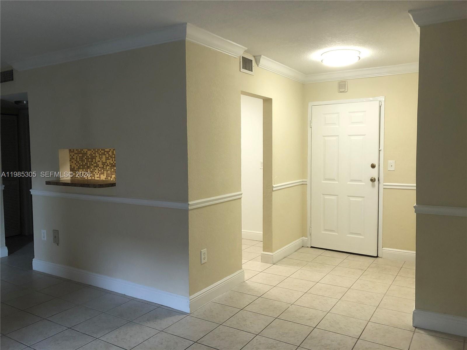 9467 Southwest 76th Street, Unit Q3 Miami, FL 33173 - Photo 14 of 18 a view of a bathroom with a shower