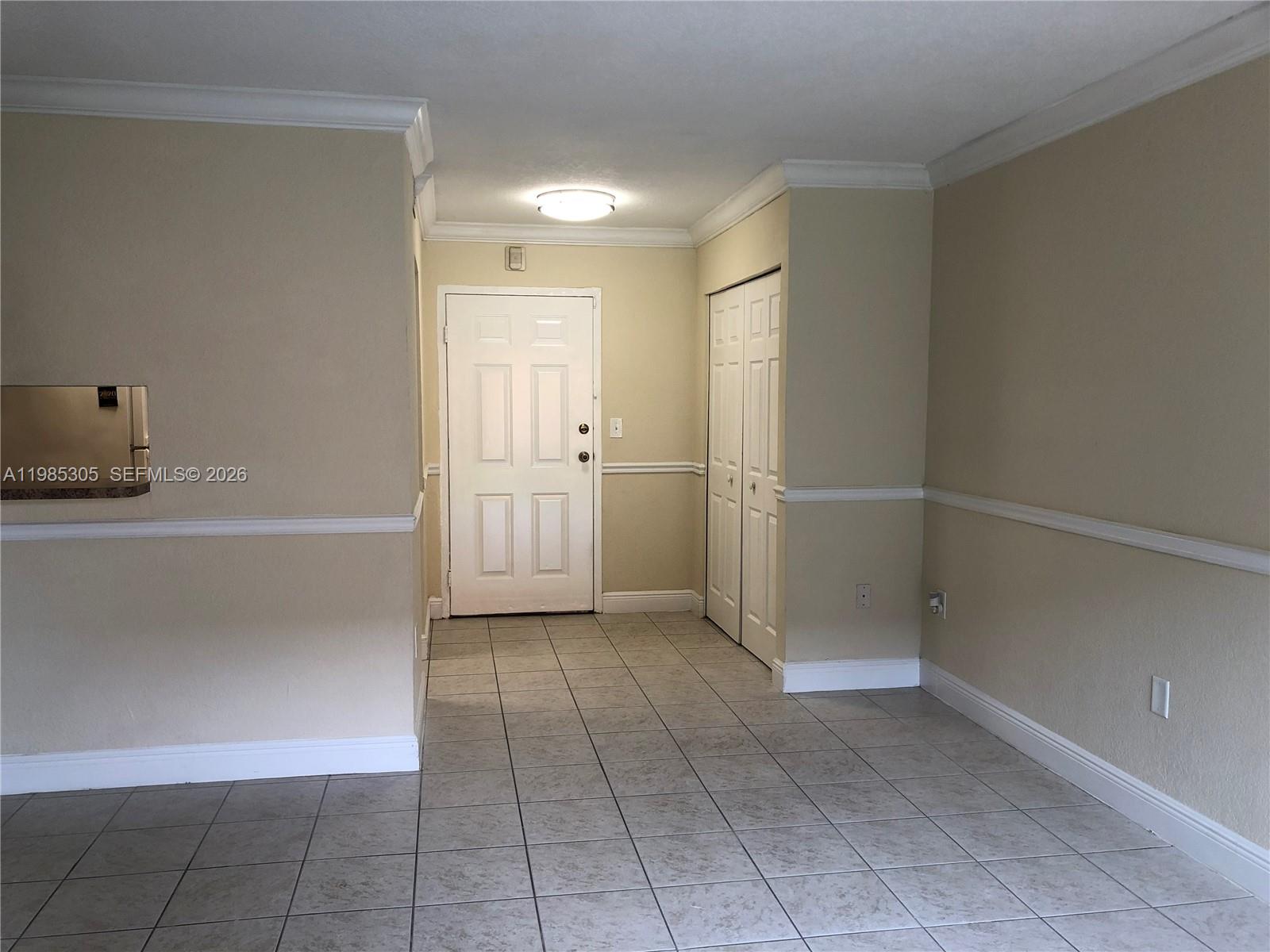 9467 Southwest 76th Street, Unit Q3 Miami, FL 33173 - Photo 6 of 18 a view of room with cabinets