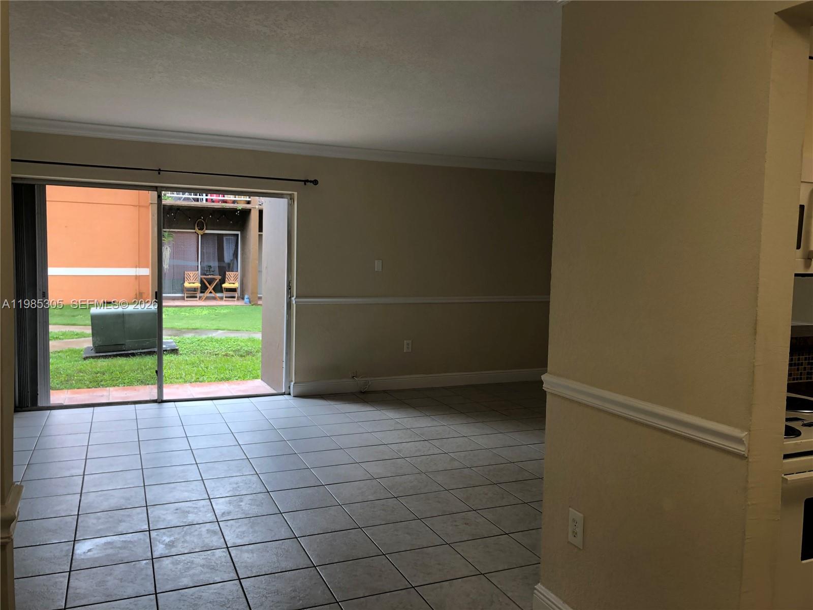 9467 Southwest 76th Street, Unit Q3 Miami, FL 33173 - Photo 7 of 18 a view of a room with furniture
