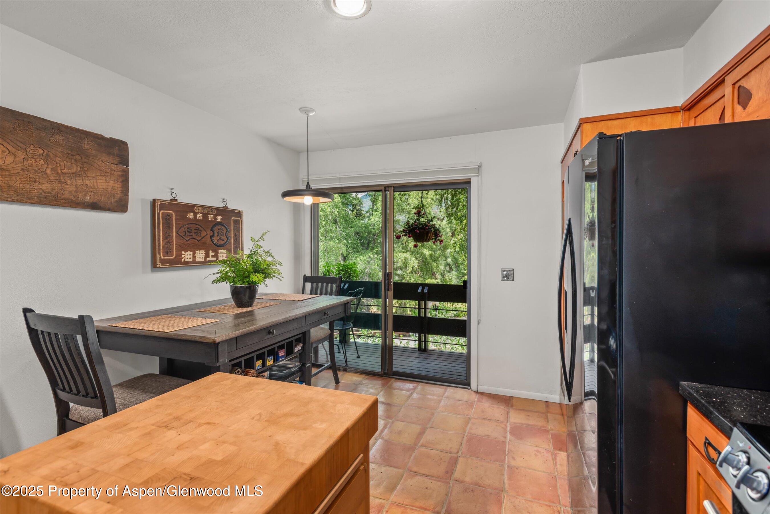 824 East Hopkins Avenue, Unit 102 AND 202 Aspen, CO 81611 - Photo 7 of 19 a view of a workspace with furniture