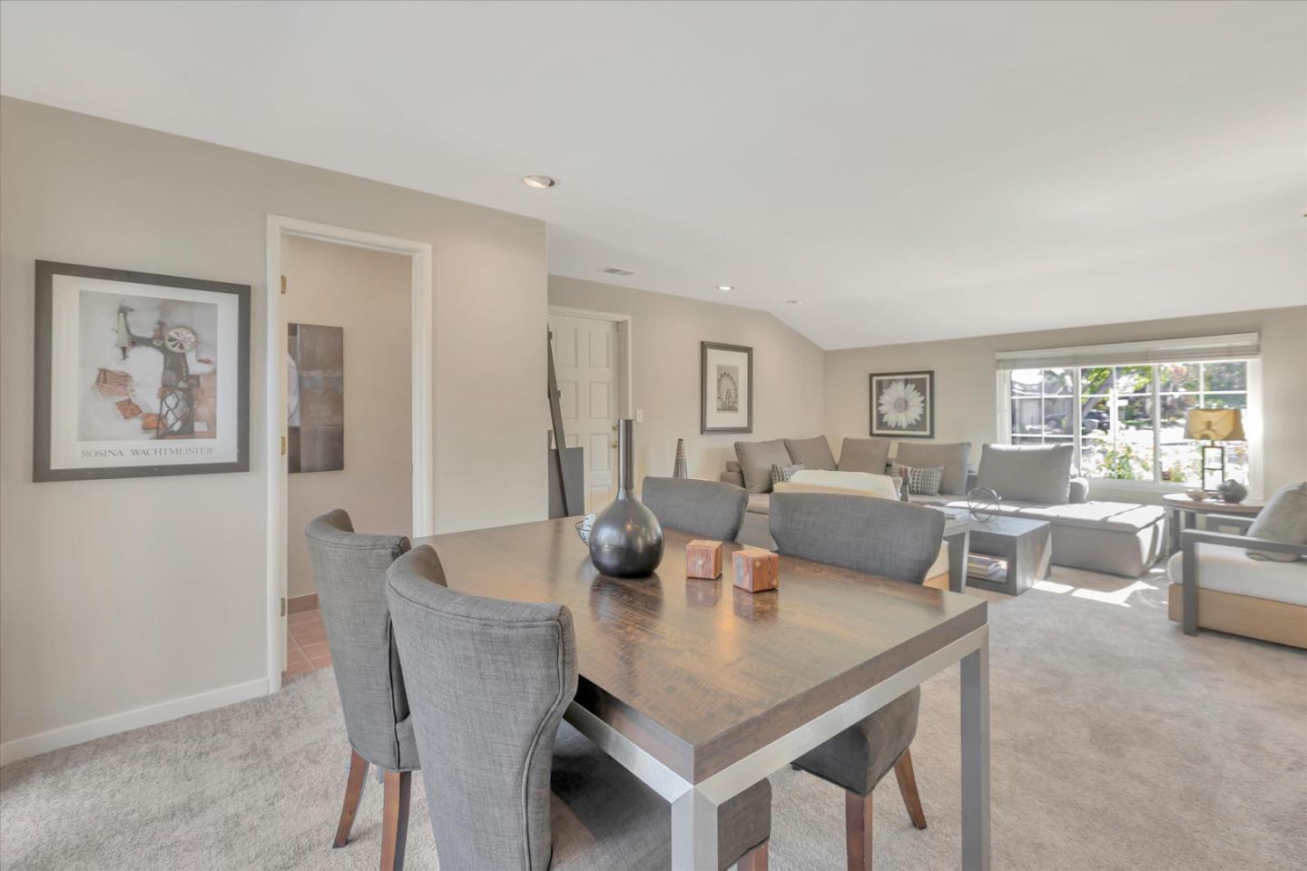 1174 Fordham Way Mountain View, CA 94040 - Photo 19 of 36 a view of a dining room with furniture and wooden floor