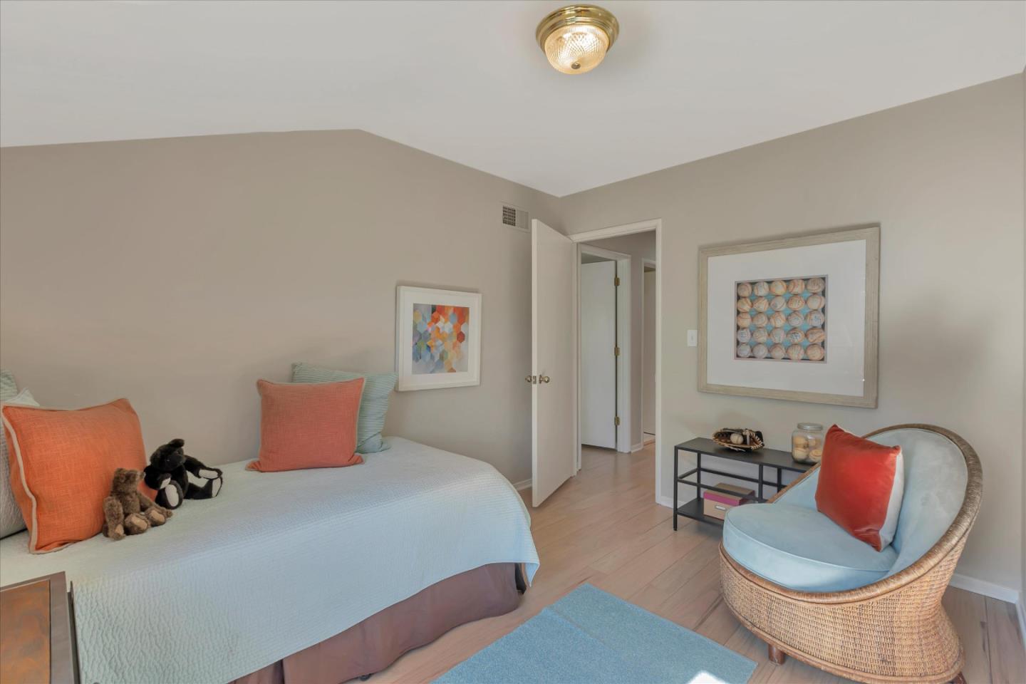 1174 Fordham Way Mountain View, CA 94040 - Photo 20 of 36 a bedroom with furniture and a wooden floor