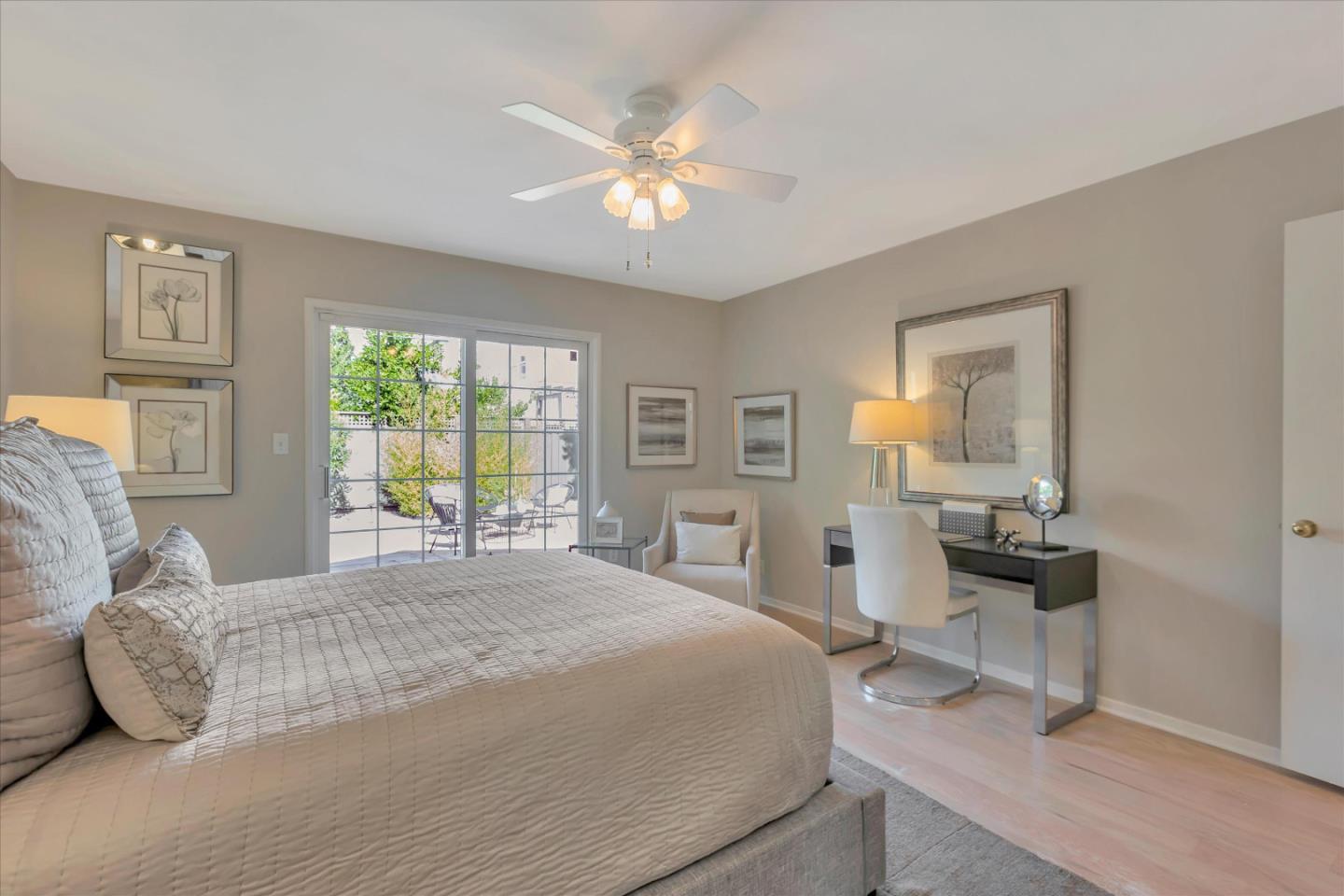 1174 Fordham Way Mountain View, CA 94040 - Photo 26 of 36 a bedroom with a bed and wooden floor