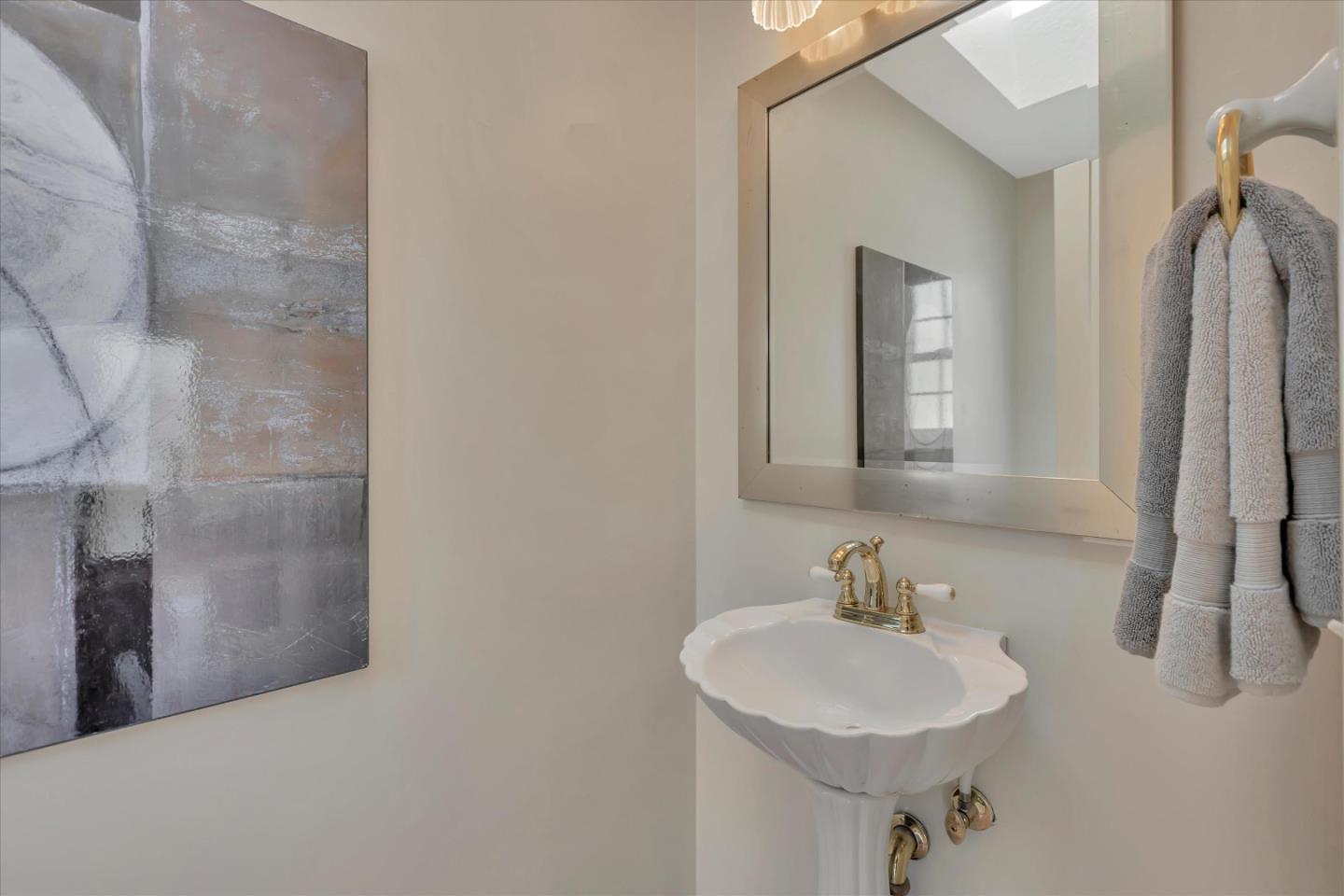 1174 Fordham Way Mountain View, CA 94040 - Photo 28 of 36 a bathroom with a sink and a mirror