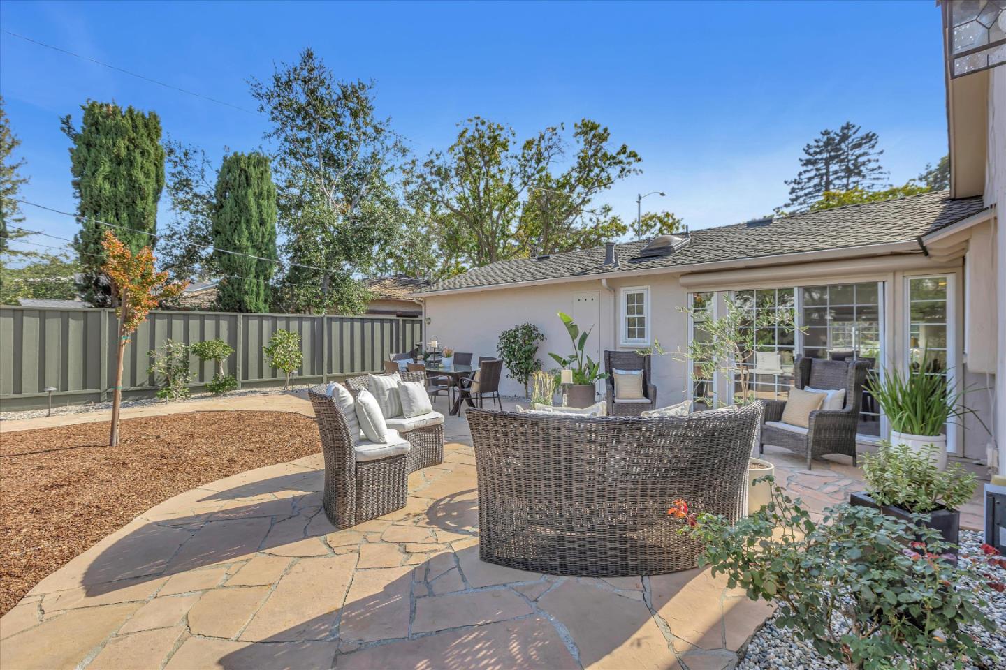 1174 Fordham Way Mountain View, CA 94040 - Photo 33 of 36 a view of a house with backyard and sitting area