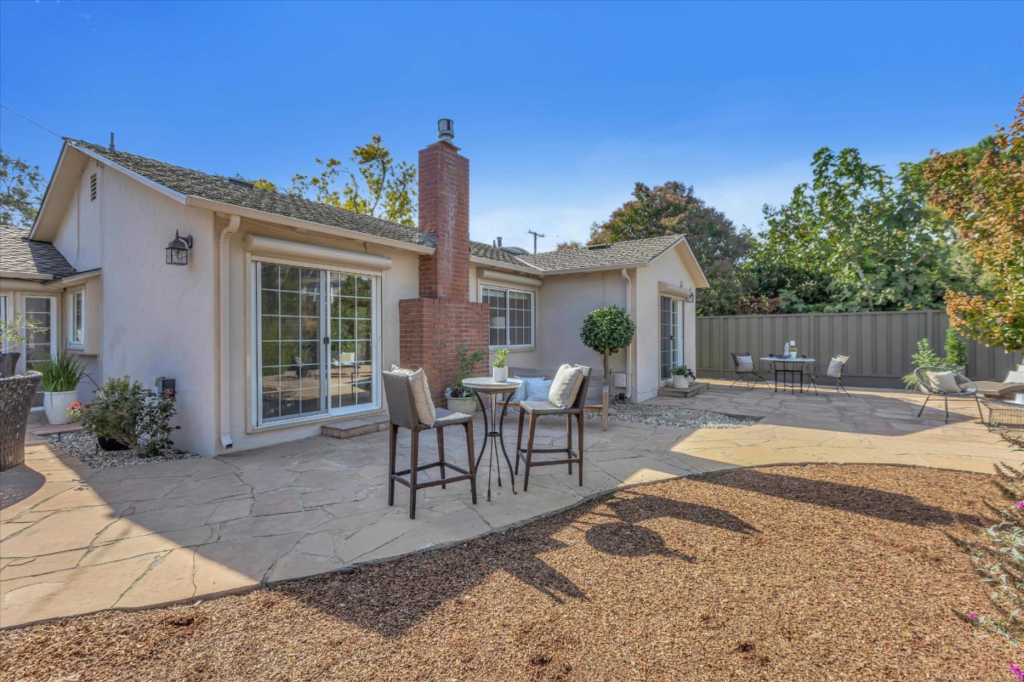 1174 Fordham Way Mountain View, CA 94040 - Photo 34 of 36 a view of a house with backyard and sitting area
