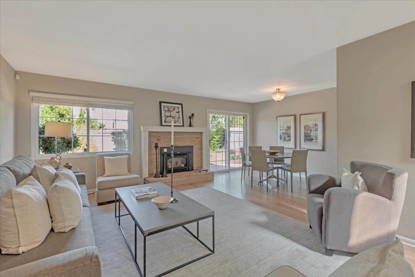 1174 Fordham Way Mountain View, CA 94040 - Photo 6 of 36 a living room with furniture and a fireplace