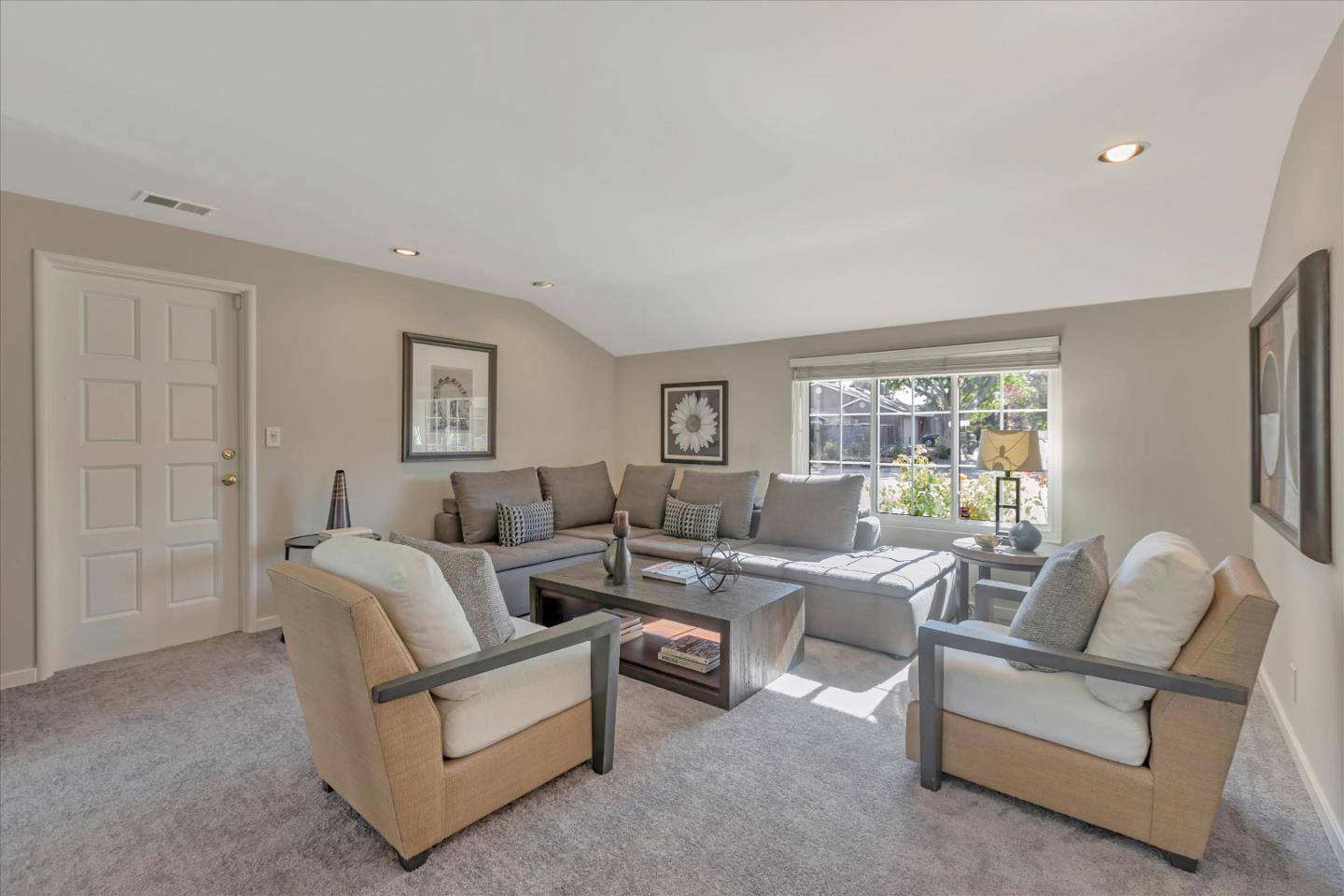 1174 Fordham Way Mountain View, CA 94040 - Photo 7 of 36 a living room with furniture and a large window