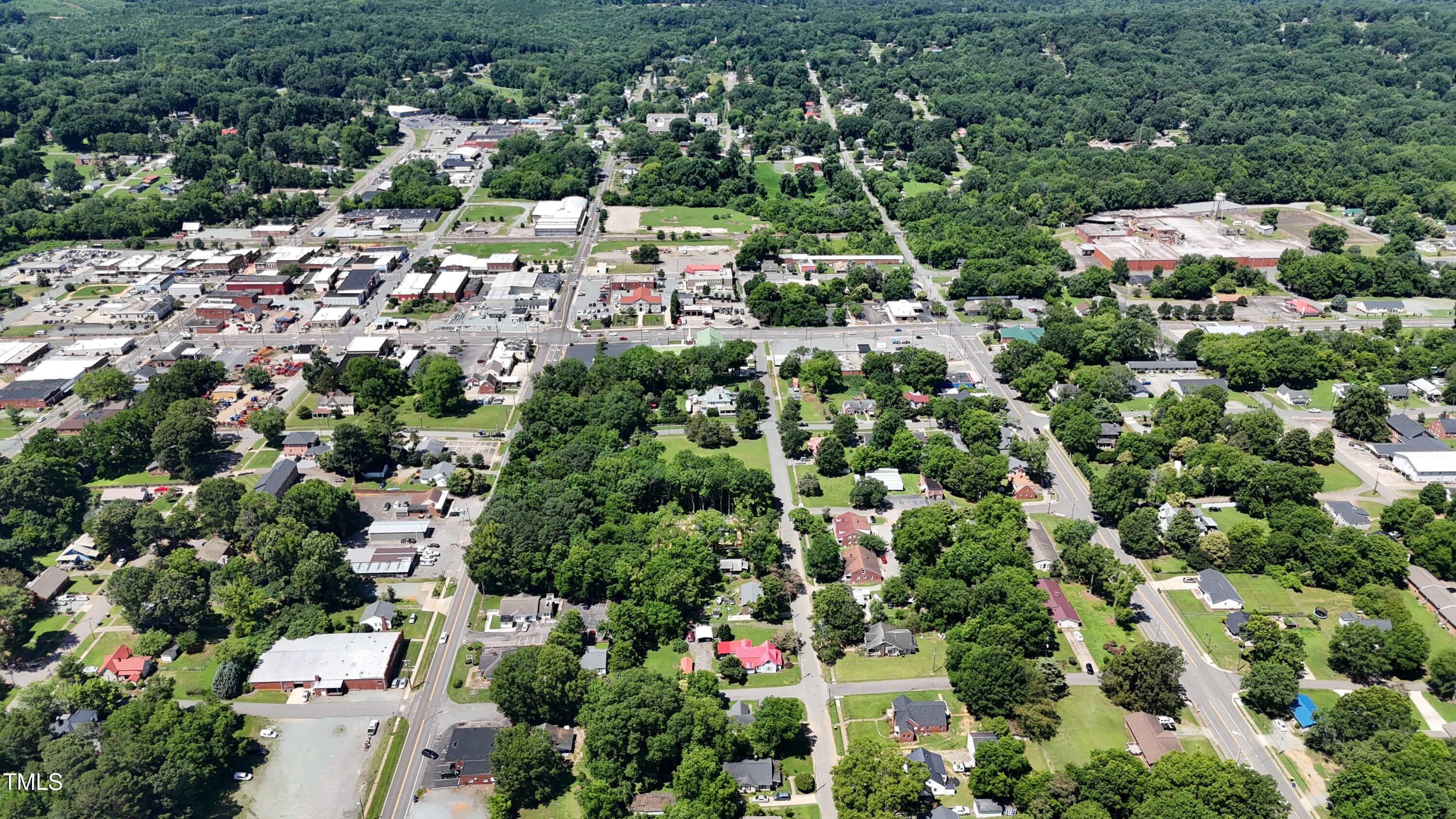Tbd East 3rd Street Siler City, NC 27344 - Photo 8 of 23 an aerial view of residential house with outdoor space and trees all around