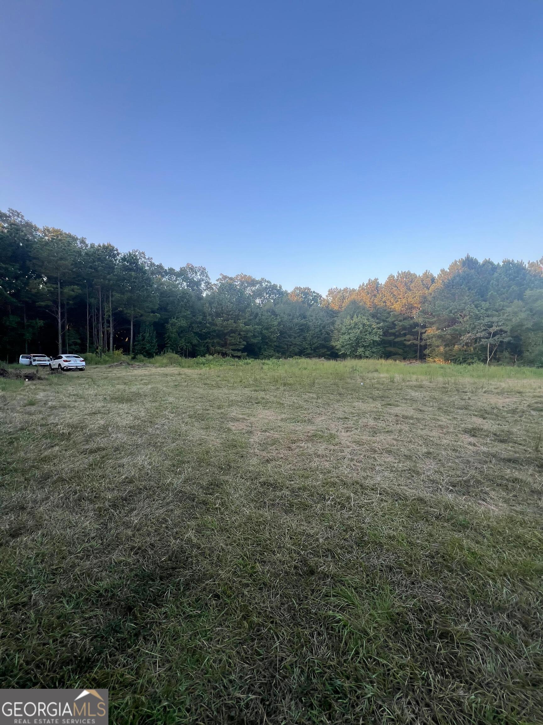 60 North East Main Street Hampton, GA 30228 - Photo 11 of 17 a view of outdoor space and mountain view