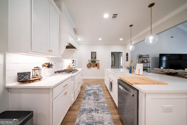 a living room with furniture fireplace and a flat screen tv