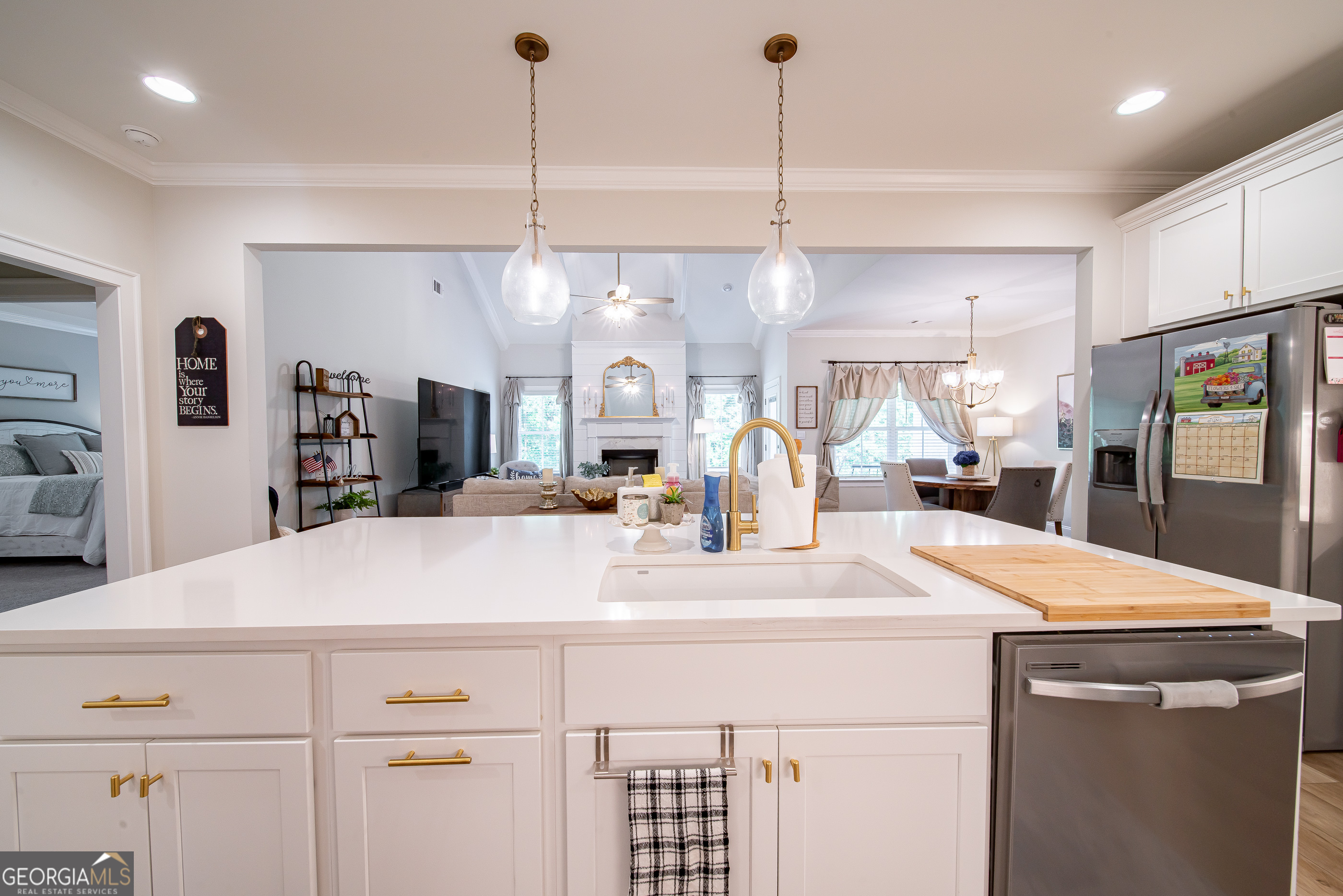 96 Cypress Trail Fortson, GA 31808 - Photo 25 of 62 a kitchen with stainless steel appliances kitchen island a refrigerator sink and stove