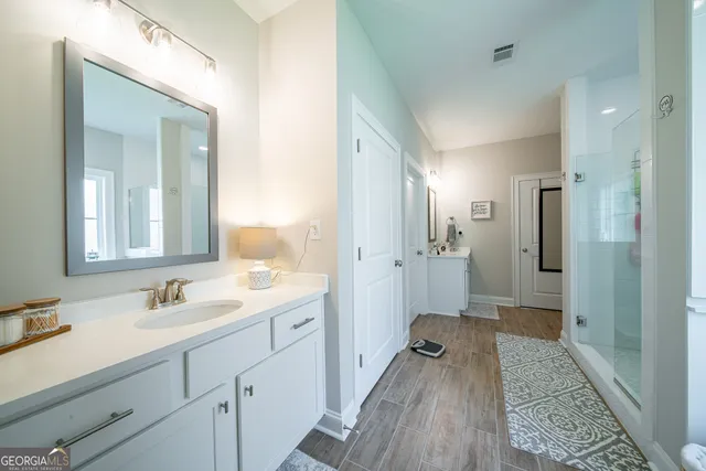 a view of utility room with racks on the wall