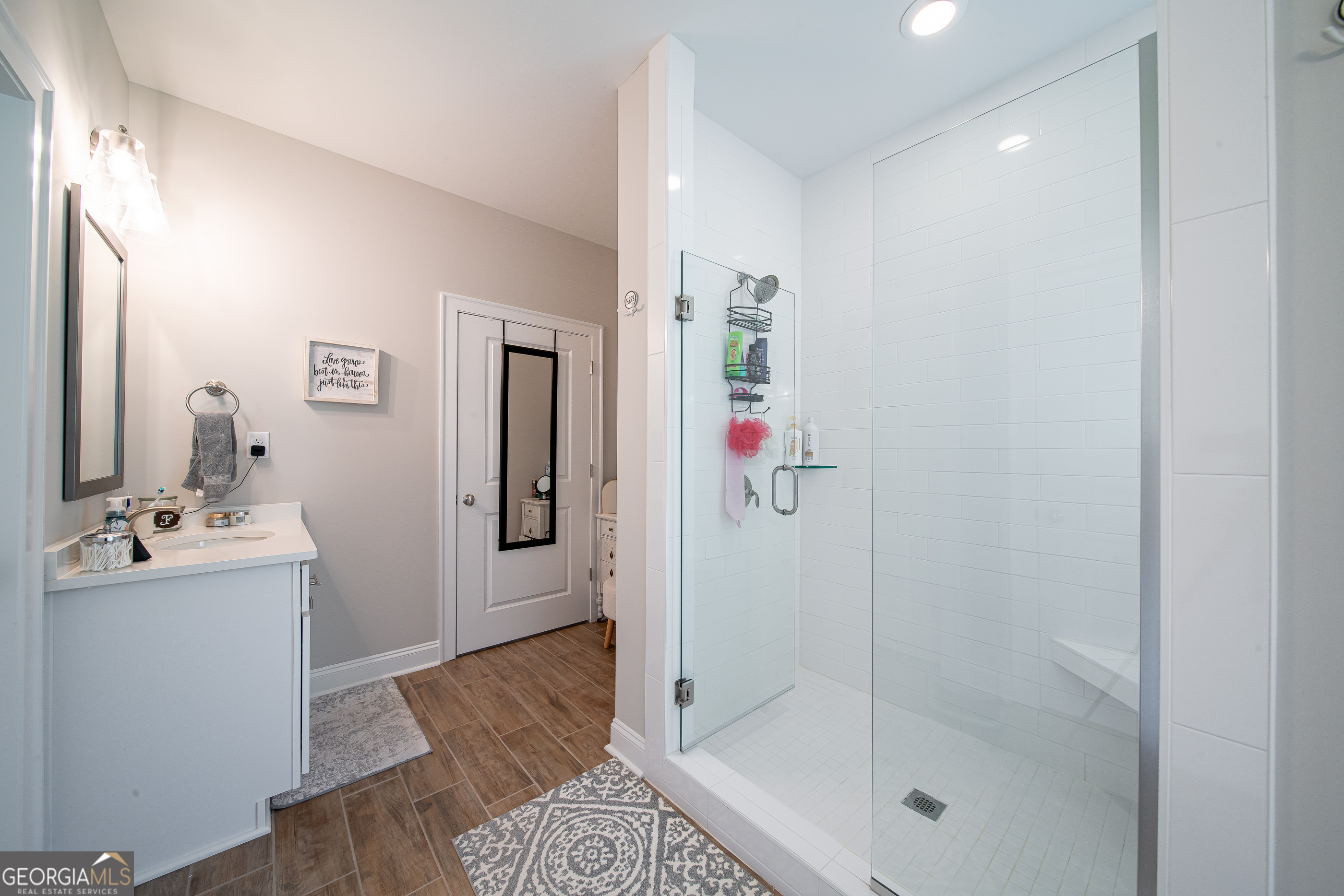 96 Cypress Trail Fortson, GA 31808 - Photo 41 of 62 a bathroom with a sink and mirror