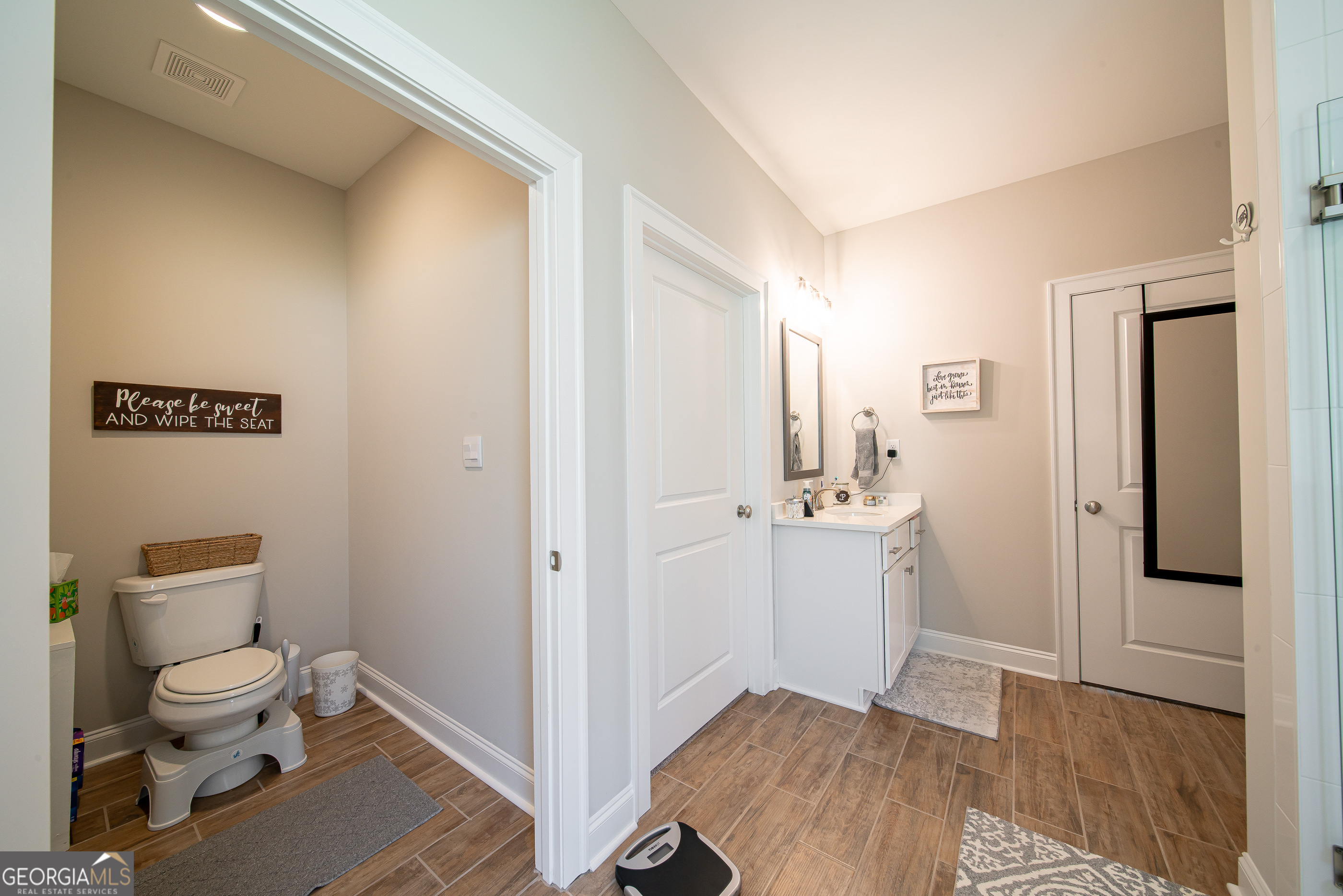 96 Cypress Trail Fortson, GA 31808 - Photo 43 of 62 a bathroom with a sink and a toilet