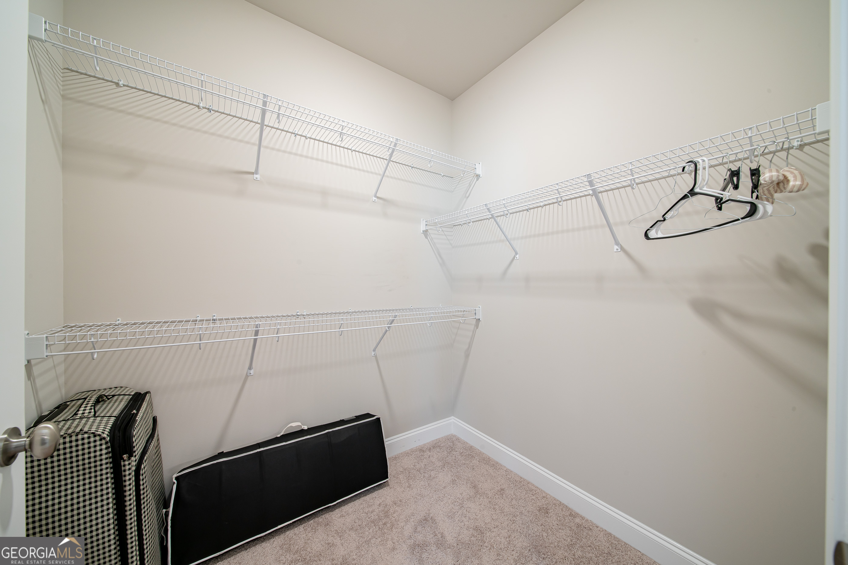 96 Cypress Trail Fortson, GA 31808 - Photo 47 of 62 a view of utility room with racks on the wall