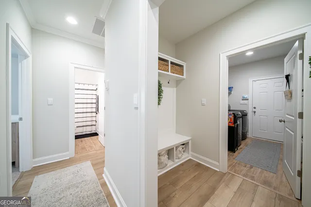 a spacious bedroom with a bed and a window