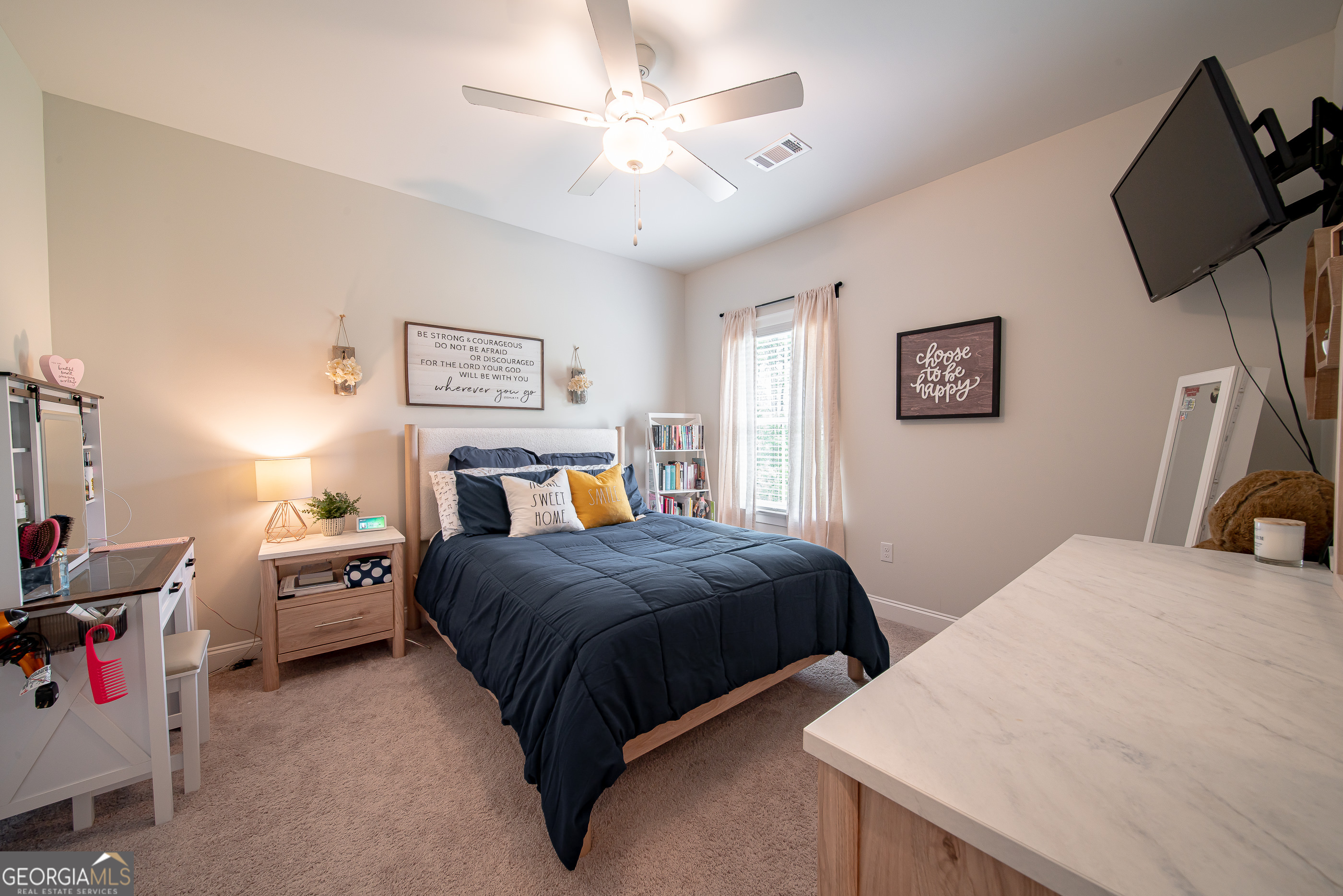 96 Cypress Trail Fortson, GA 31808 - Photo 52 of 62 a bedroom with a bed and ceiling fan