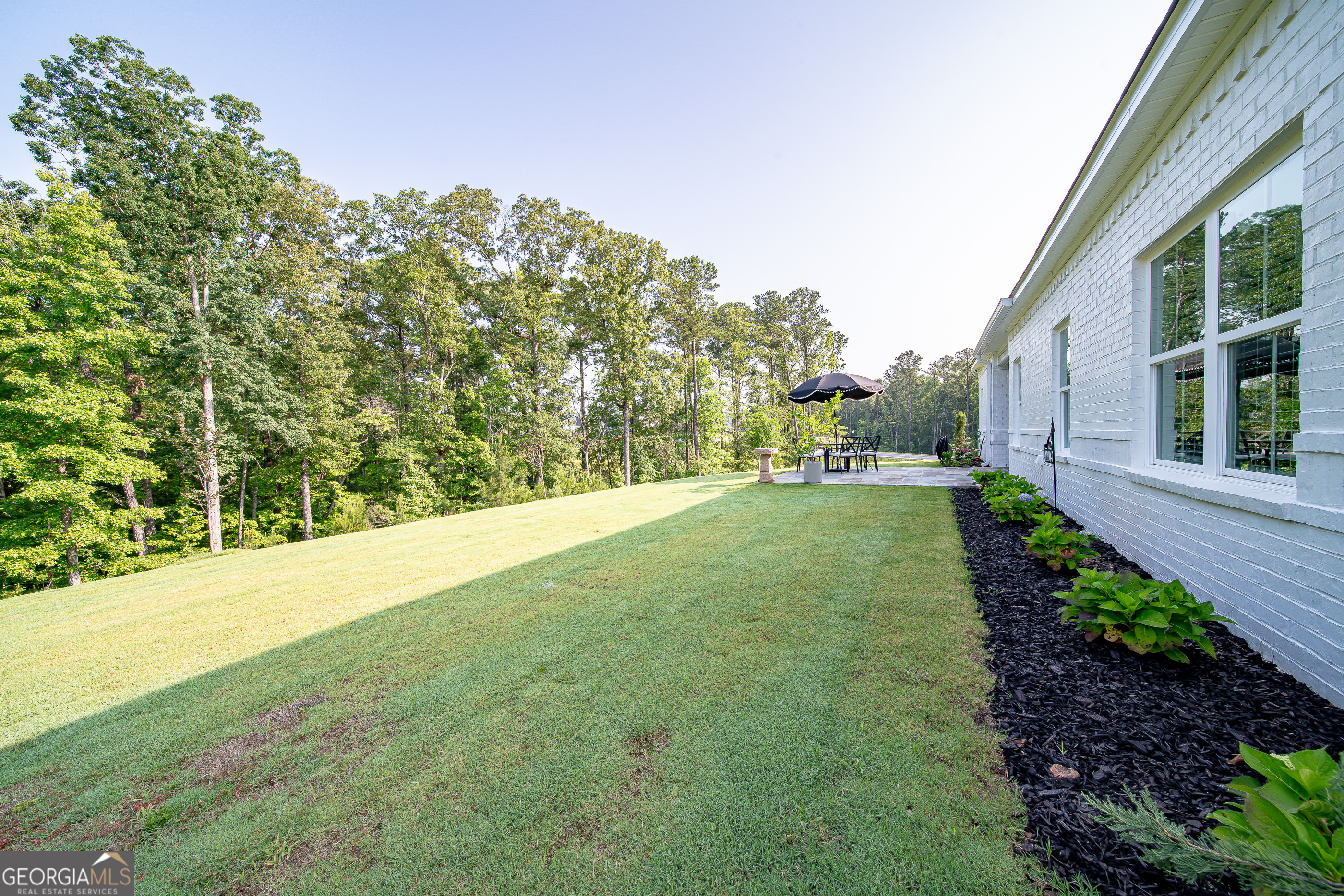 96 Cypress Trail Fortson, GA 31808 - Photo 7 of 62 a view of a yard with an trees